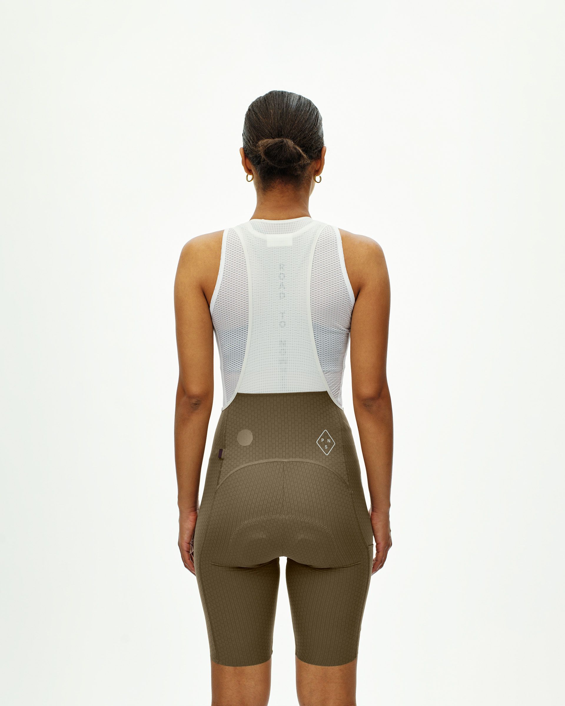 Dark Stone T.K.O. Essential Light Cargo bibs on model, rear view with mesh back panel