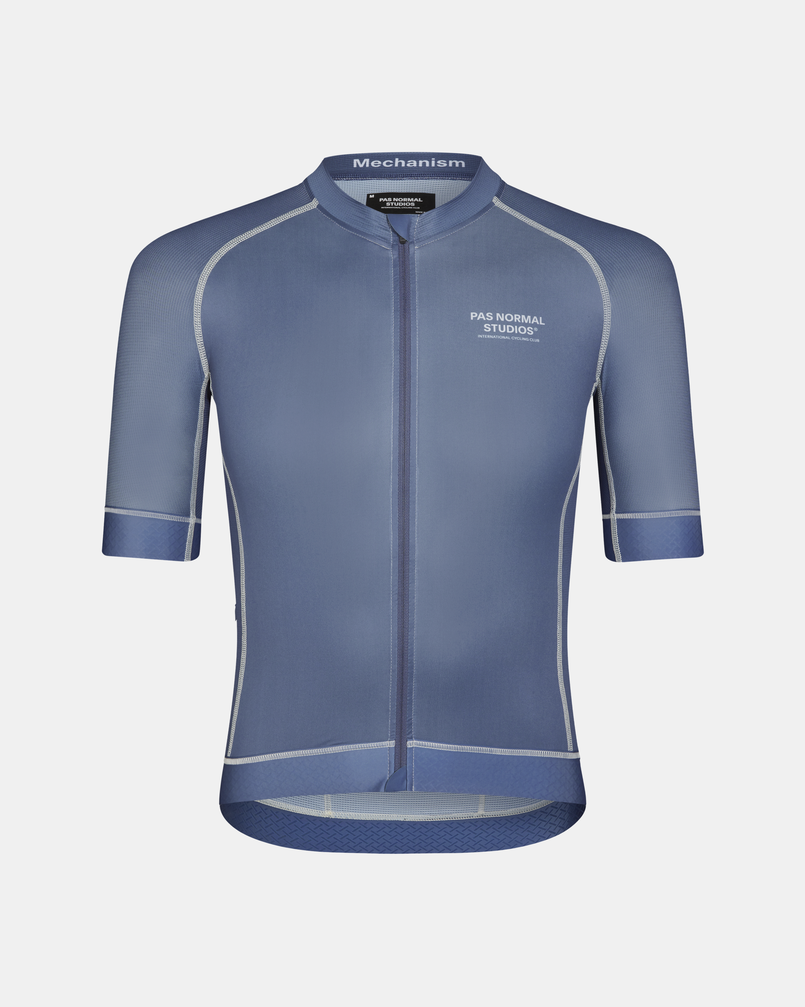 Light Indigo Mechanism cycling jersey, front view with contrast stitching and textured hem panel