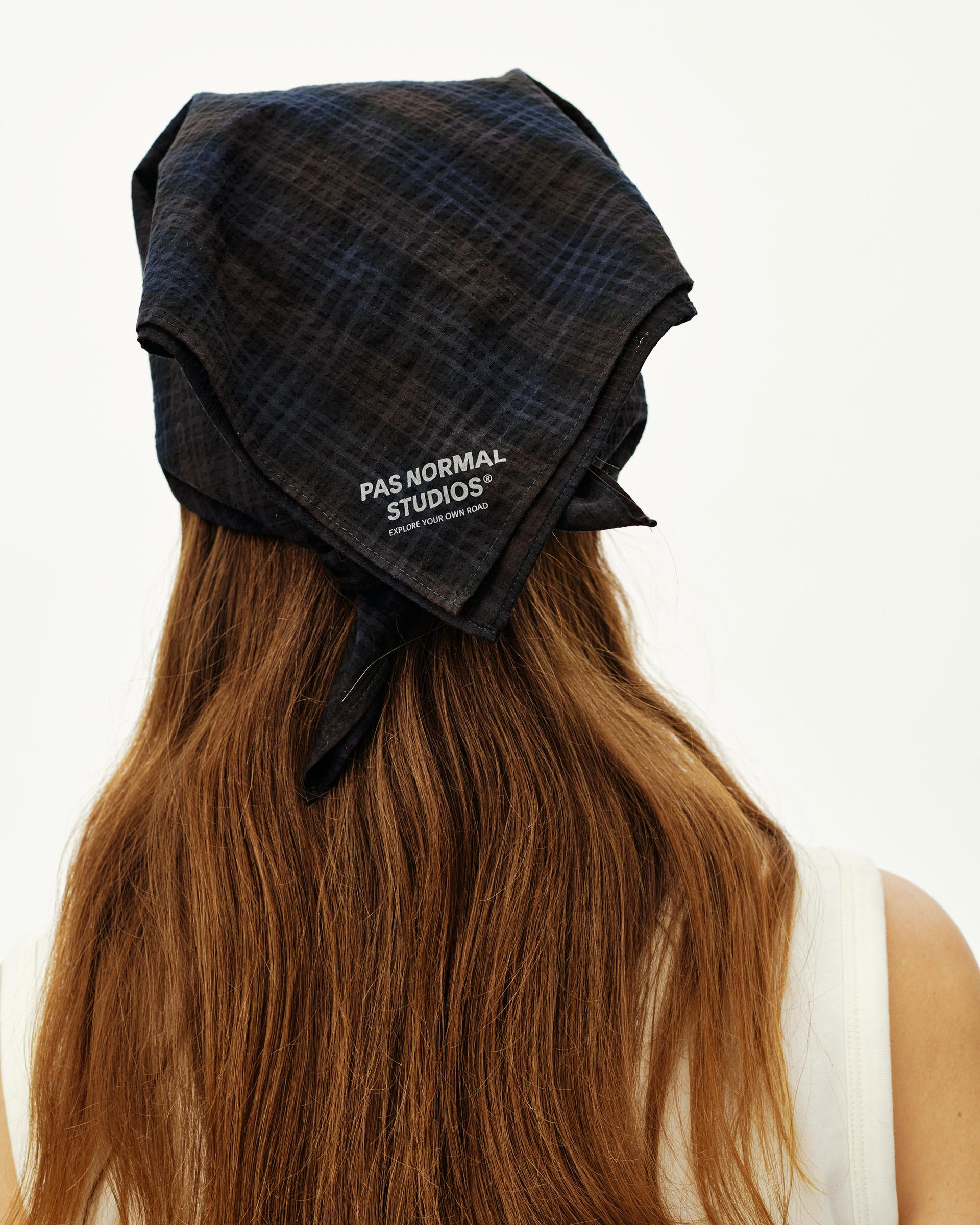 Dark Navy Off-Race Seersucker bandana worn on model, rear view with check texture and tied knot
