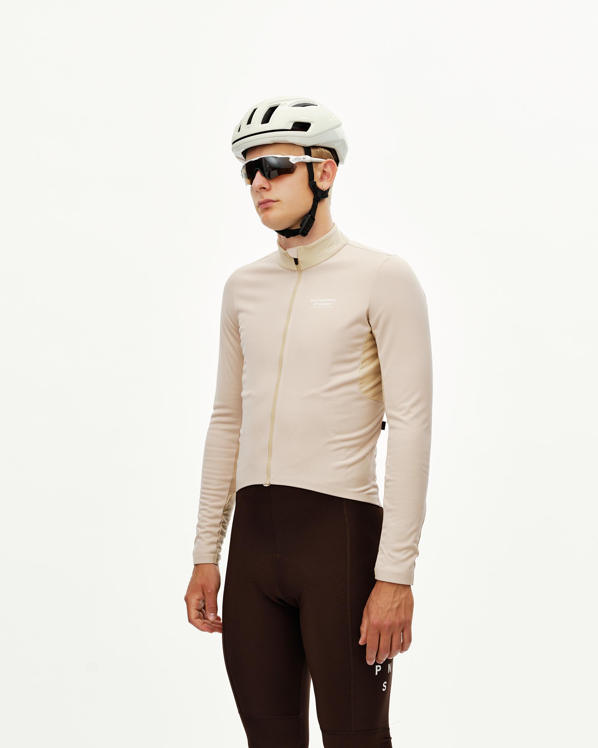 Linen Mechanism Thermal Long Sleeve cycling jersey on model, three-quarter front view with contrast side panel