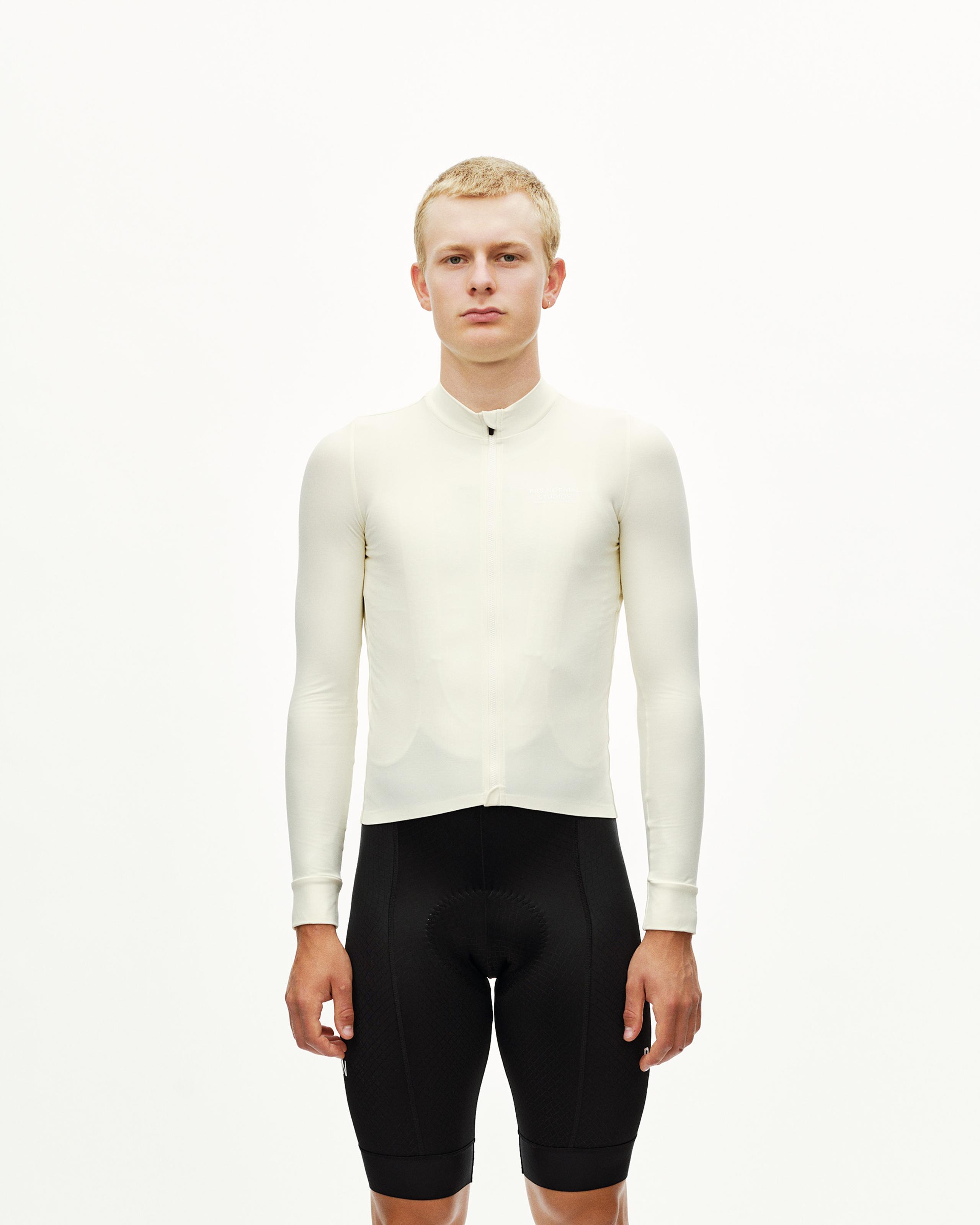 Off White Mechanism long sleeve cycling jersey on model, front view with half zip collar