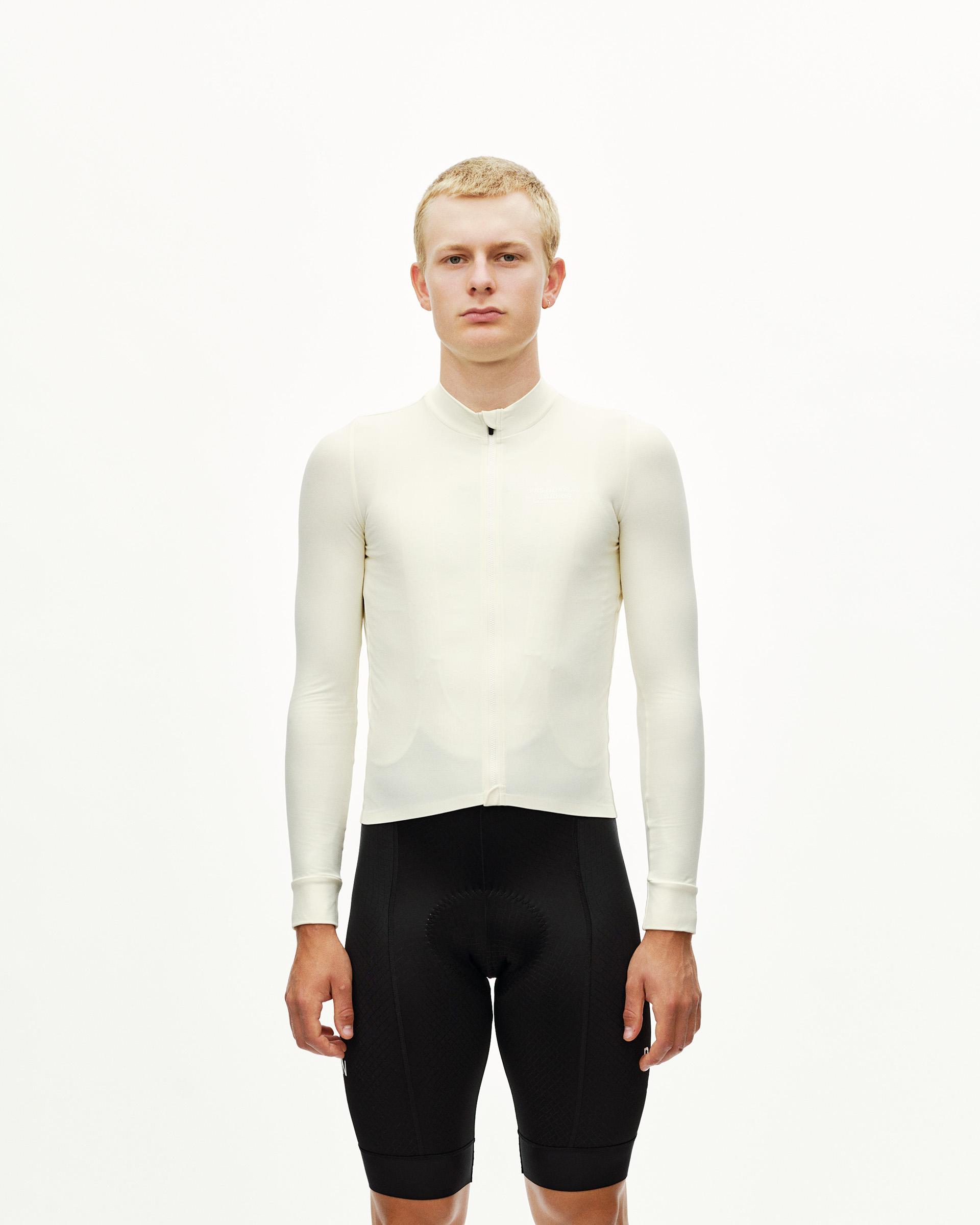 Off White Mechanism long sleeve cycling jersey on model, front view with half zip collar