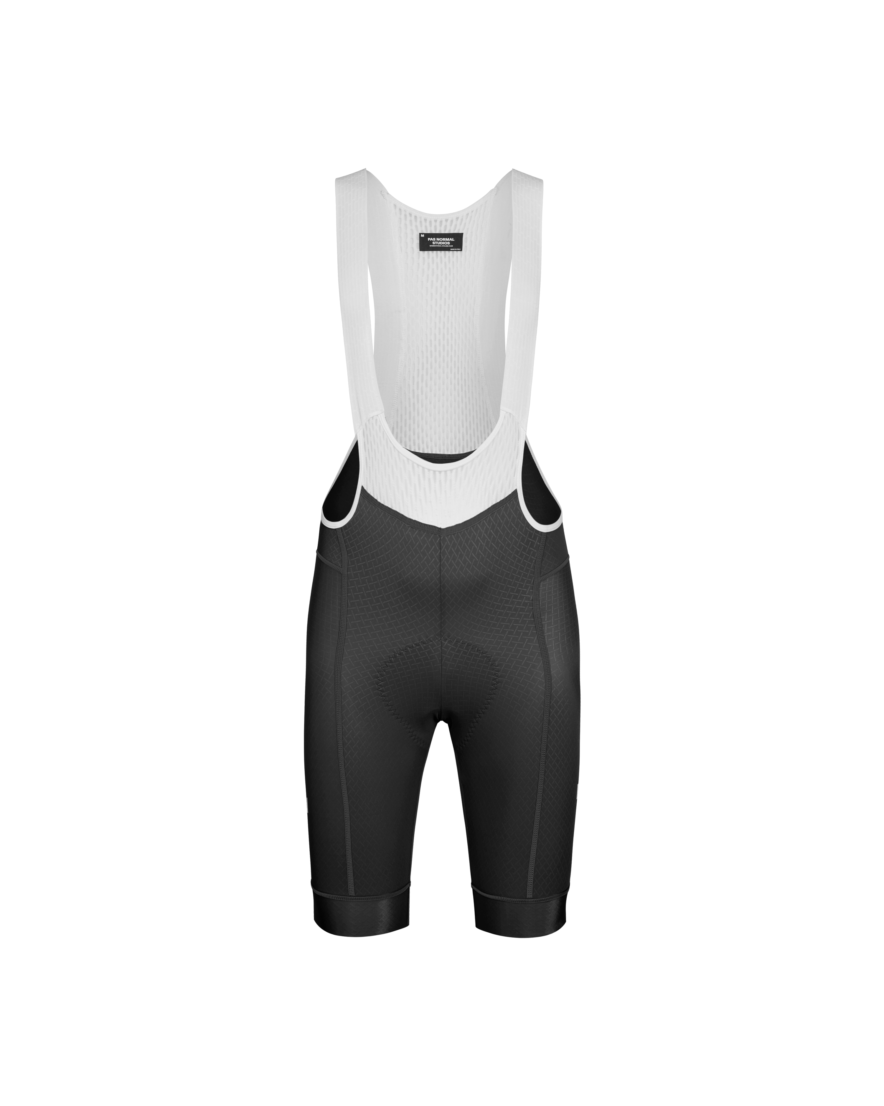 Black Mechanism cycling bibs, front flat lay with white mesh bib straps