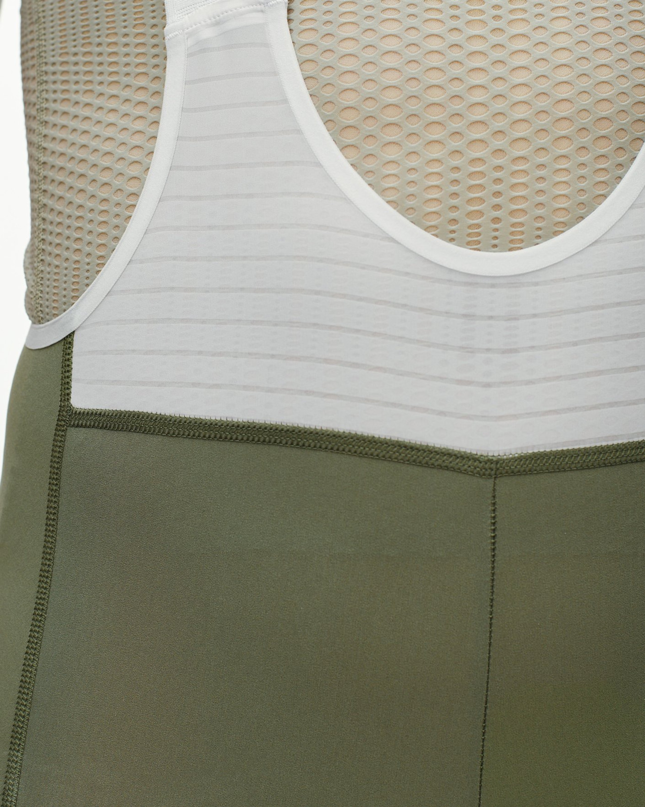 Army Green PAS Mechanism Pro bibs, detail view showing white mesh back panel and contrast stitching