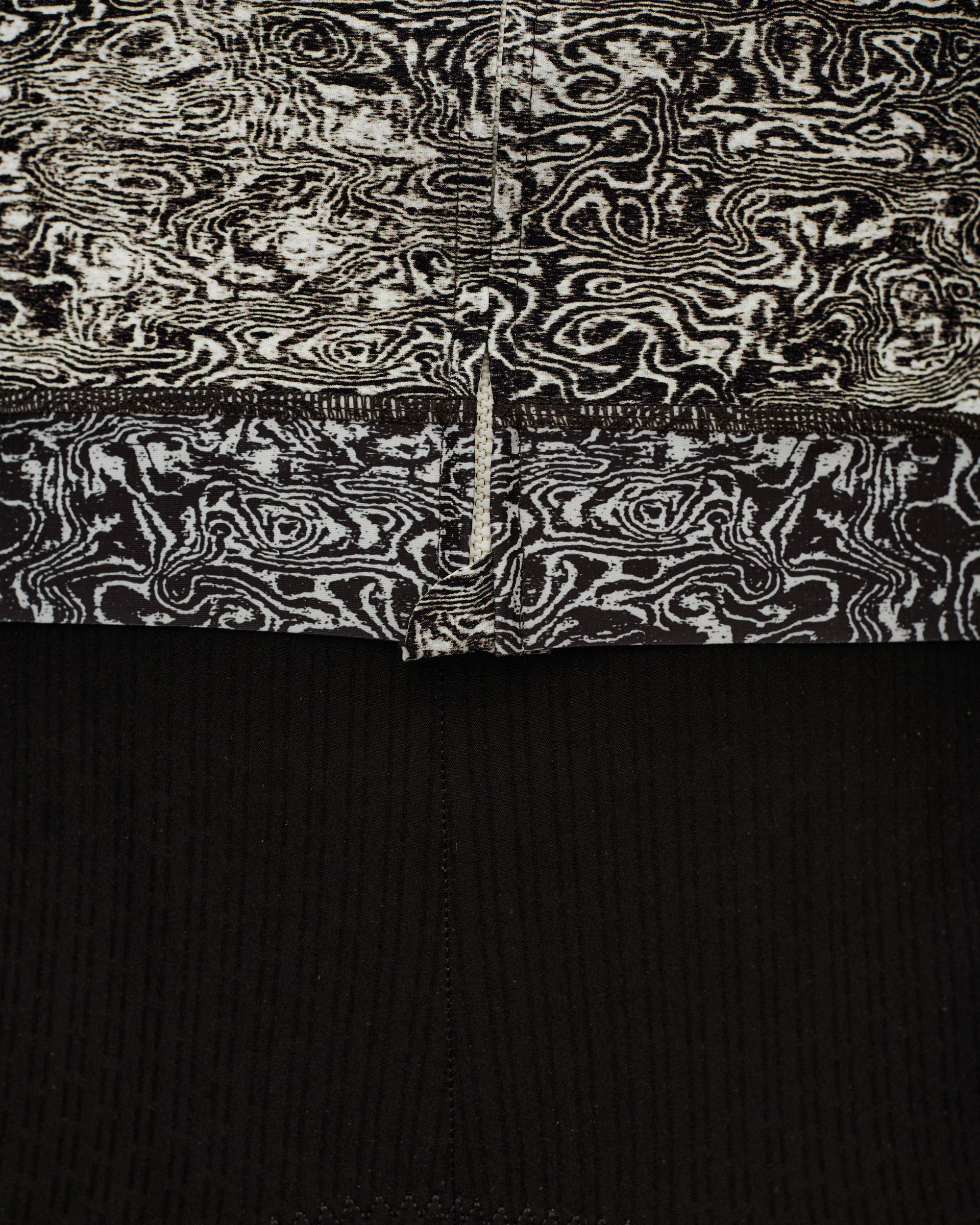 Off White Essential cycling jersey, detail view of hem and rear zip with abstract swirl all-over print