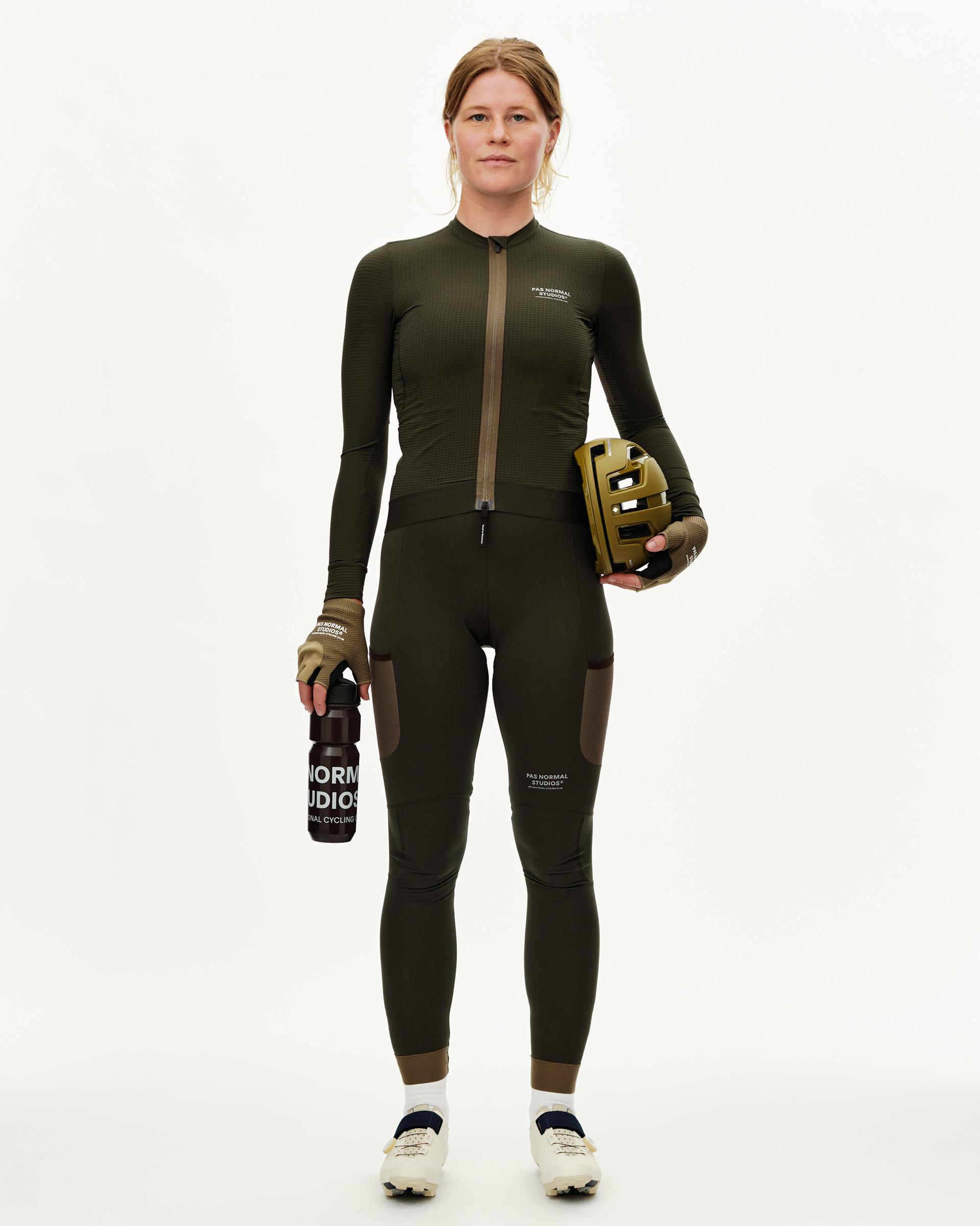 Dark Olive Escapism women's long sleeve cycling jersey, front view on model with contrast zip