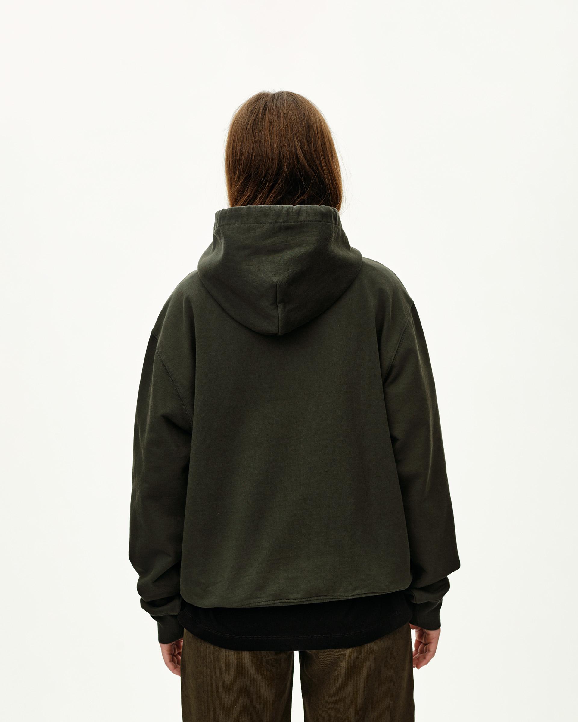 Dark Olive Off-Race hoodie on model, rear view with black ribbed hem