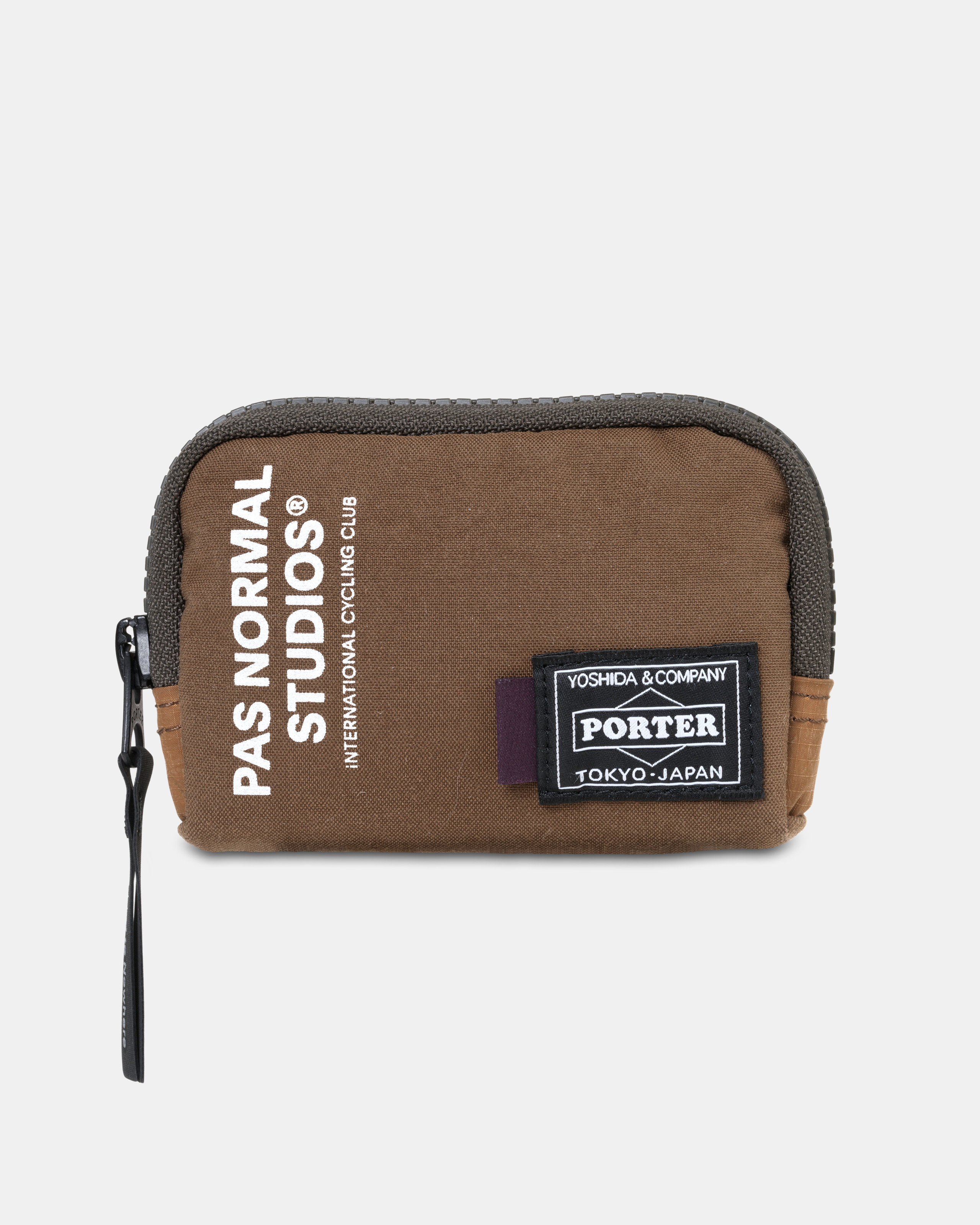 Light Brown Porter-Yoshida coin case, front flat lay with white logo print and Porter badge patch