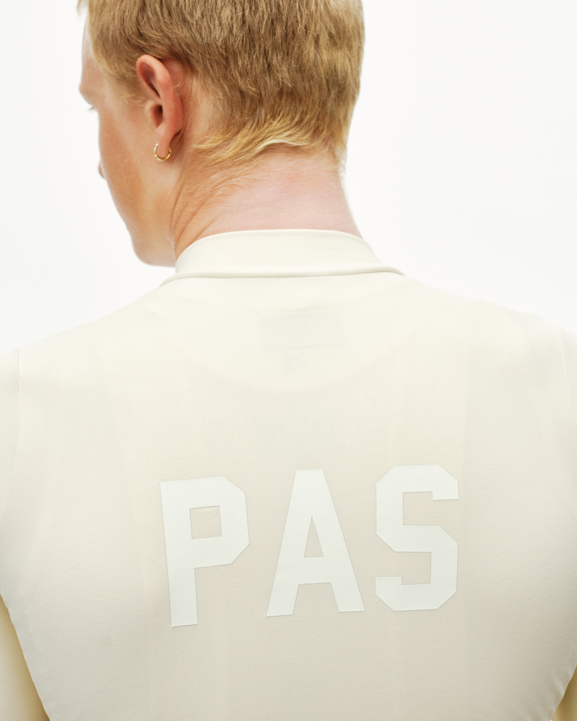 Sand PAS Mechanism long sleeve cycling jersey on model, rear view with tonal PAS back print