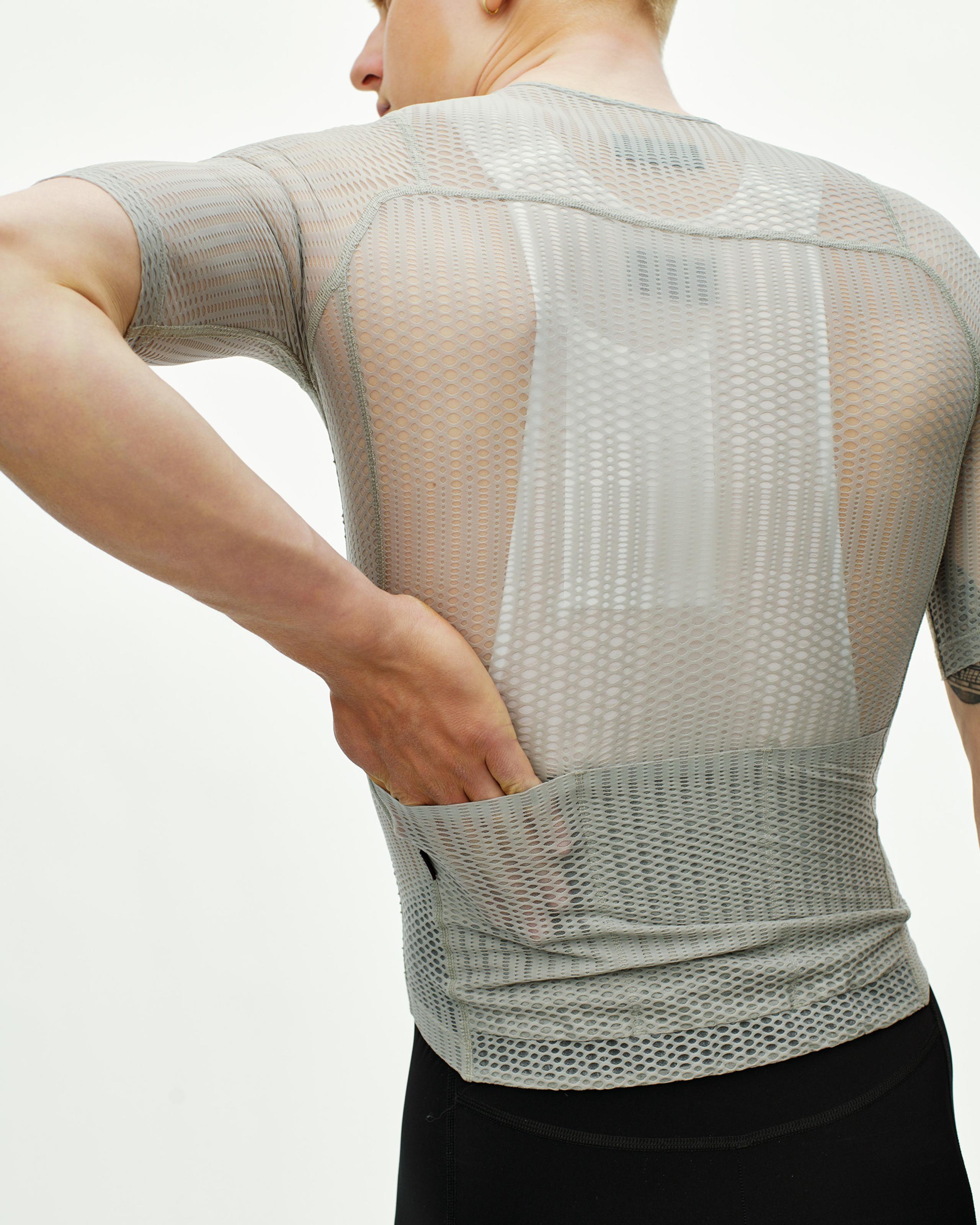 Light Grey PAS Mechanism Pro Zipless cycling jersey, rear view on model with mesh construction