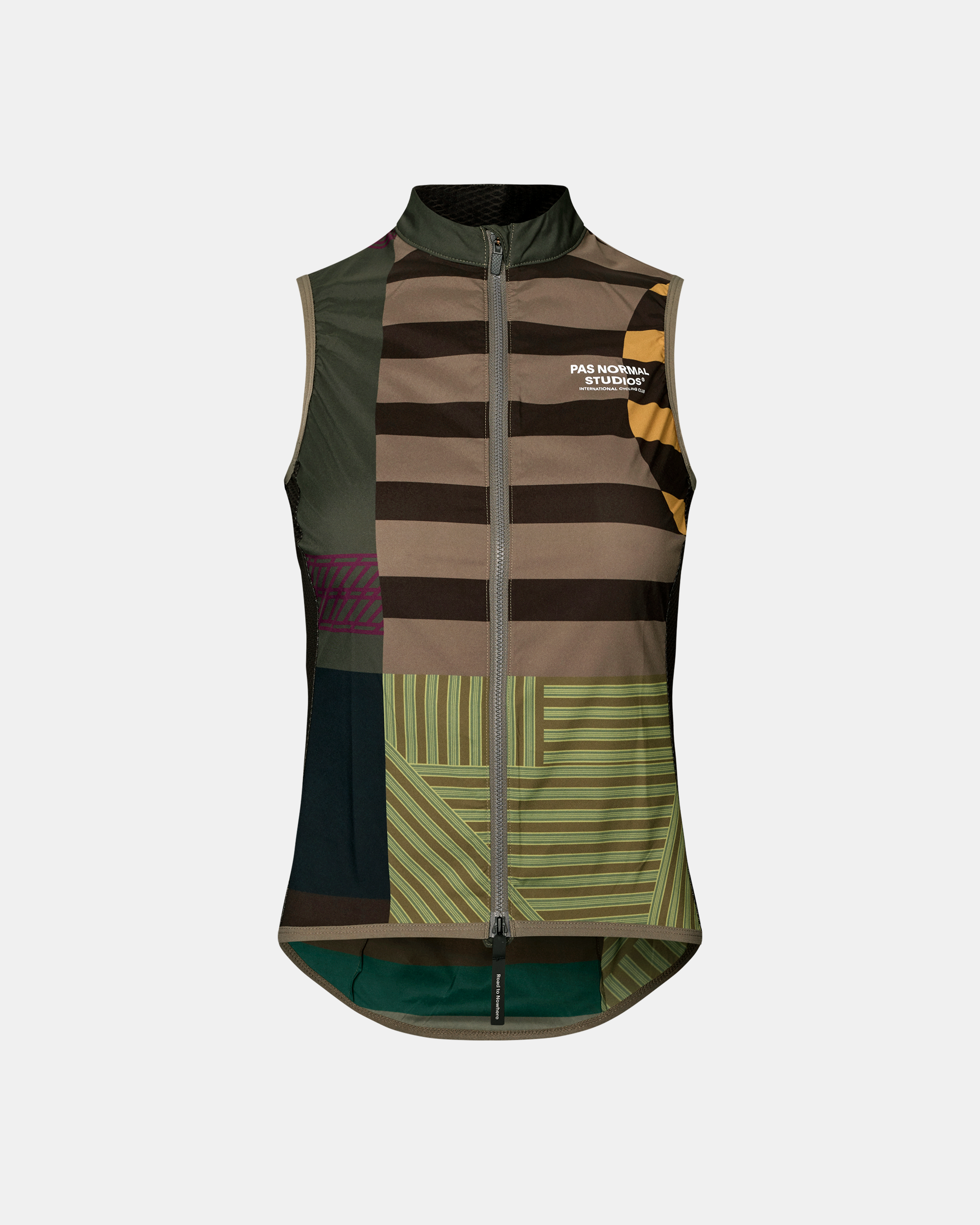 Stow Away cycling gilet in International Earth with multi-pattern patchwork of olive, brown, tan, green, mustard, and purple
