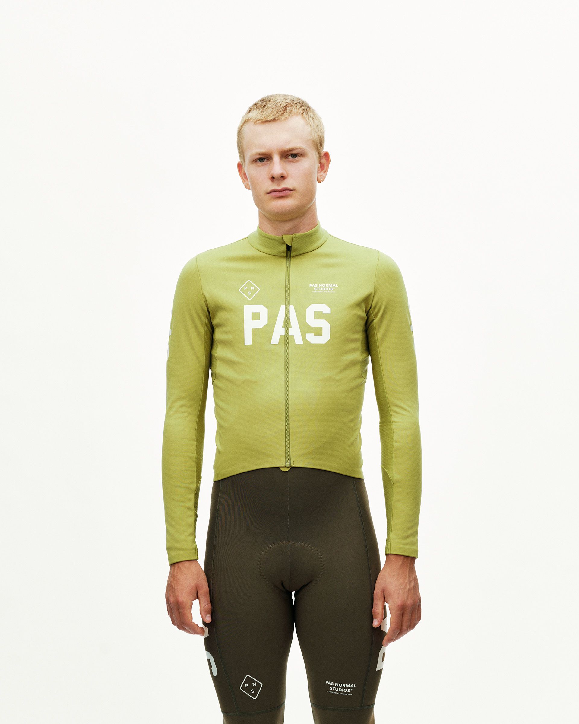 Dark Lime green PAS Mechanism Thermal Long Sleeve cycling jersey on model, front view with white chest print