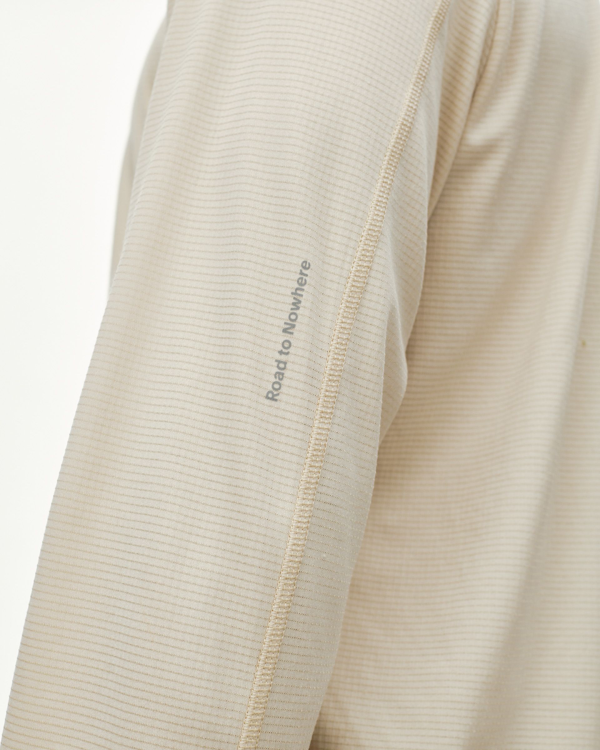 Sand Balance Long Sleeve T-Shirt, sleeve detail view with grey Road to Nowhere print and contrast seam