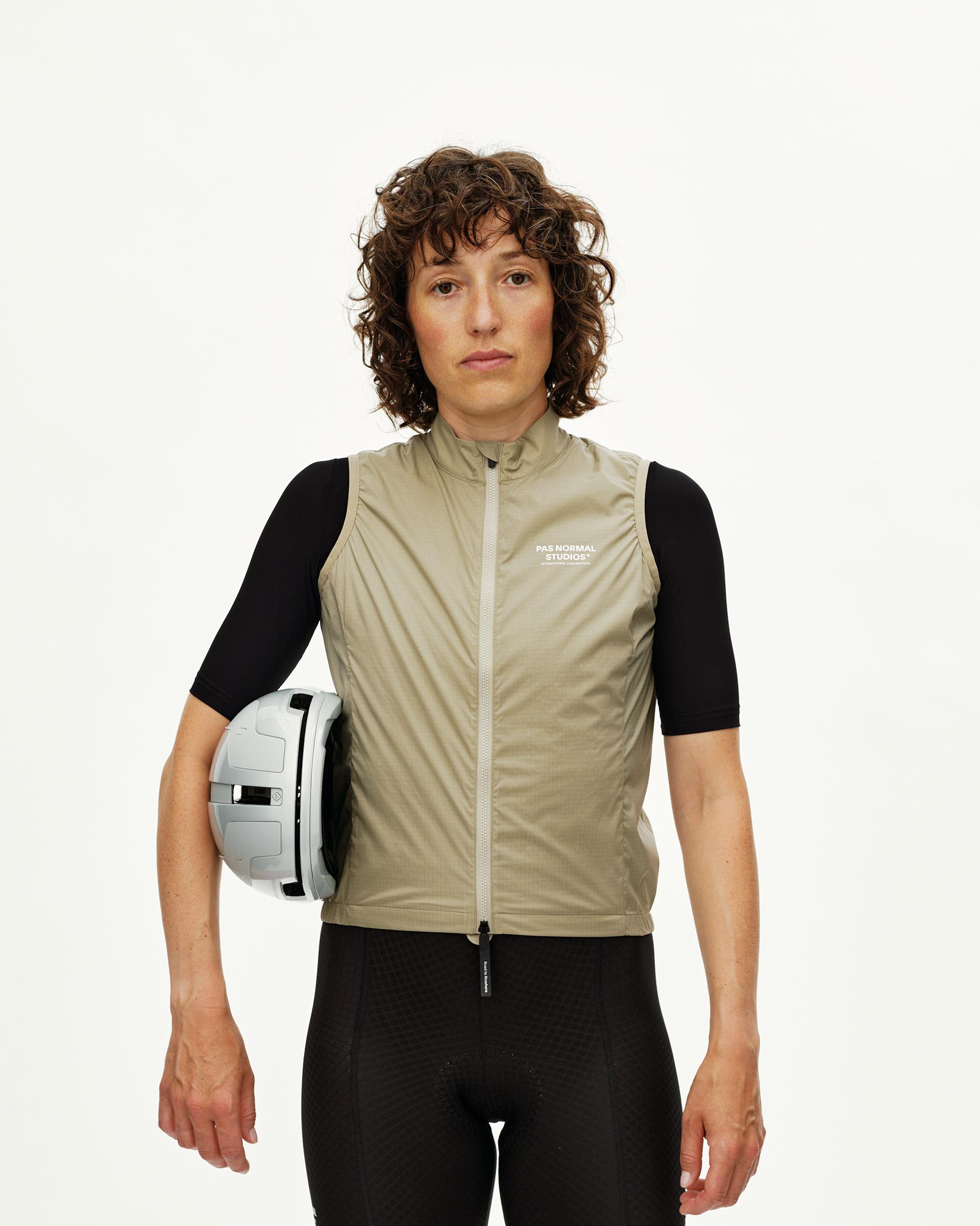 Grey Sage Essential Insulated cycling gilet on model, front view with full zip and white chest logo