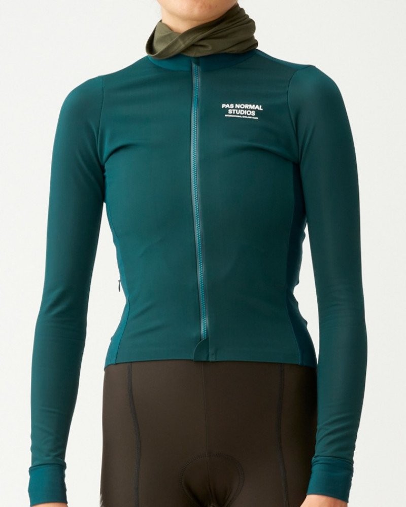 Navy Mechanism Thermal long sleeve cycling jersey on model with white chest logo