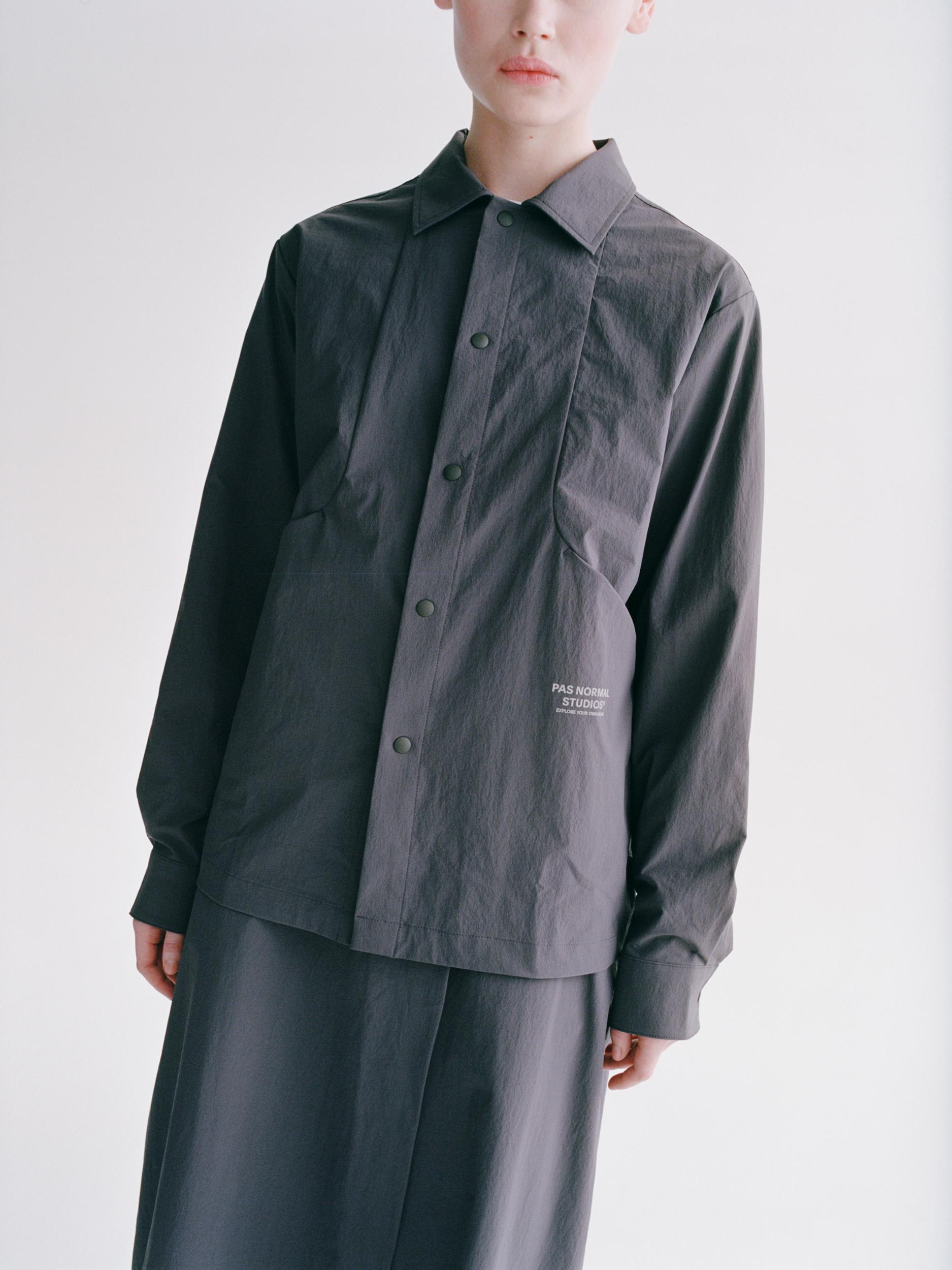 Steel Off-Race Tech Overshirt on model with button front and white chest logo