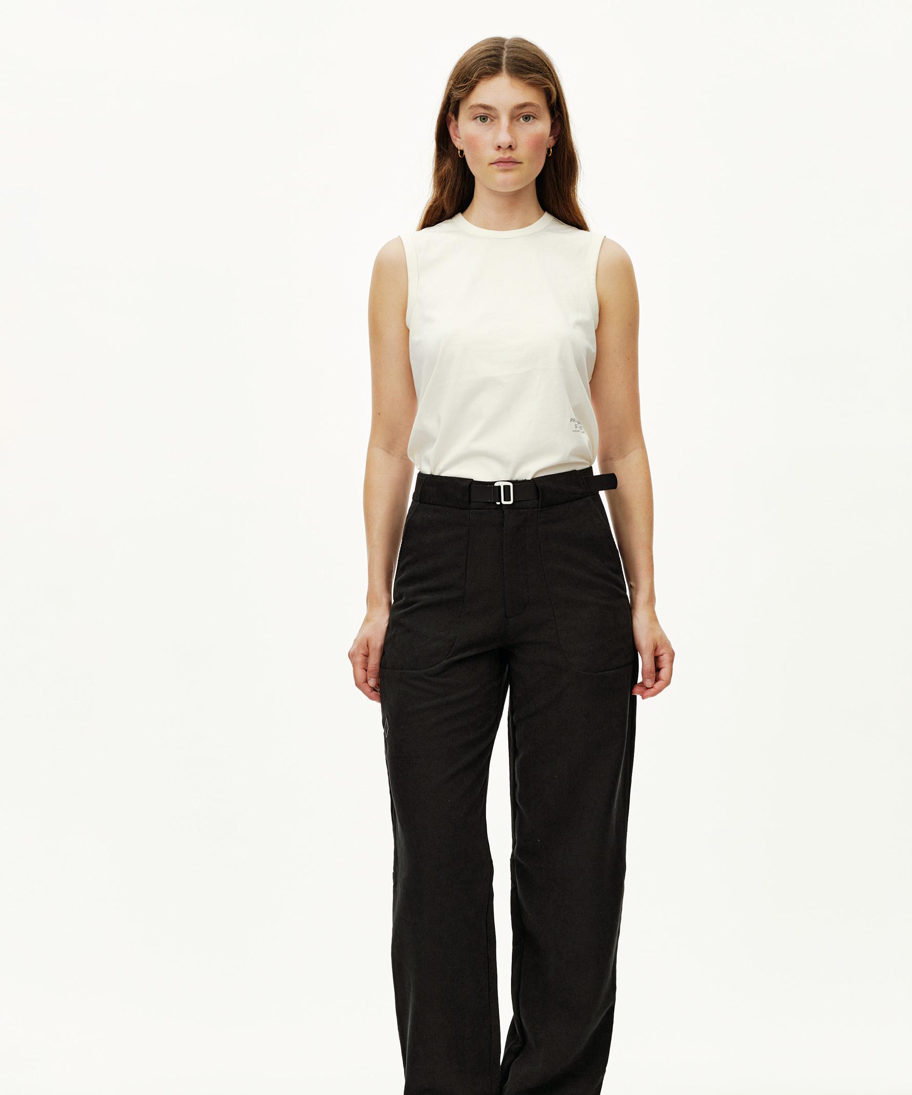 Black Off-Race Corduroy pants on model, front view with integrated belt buckle waistband