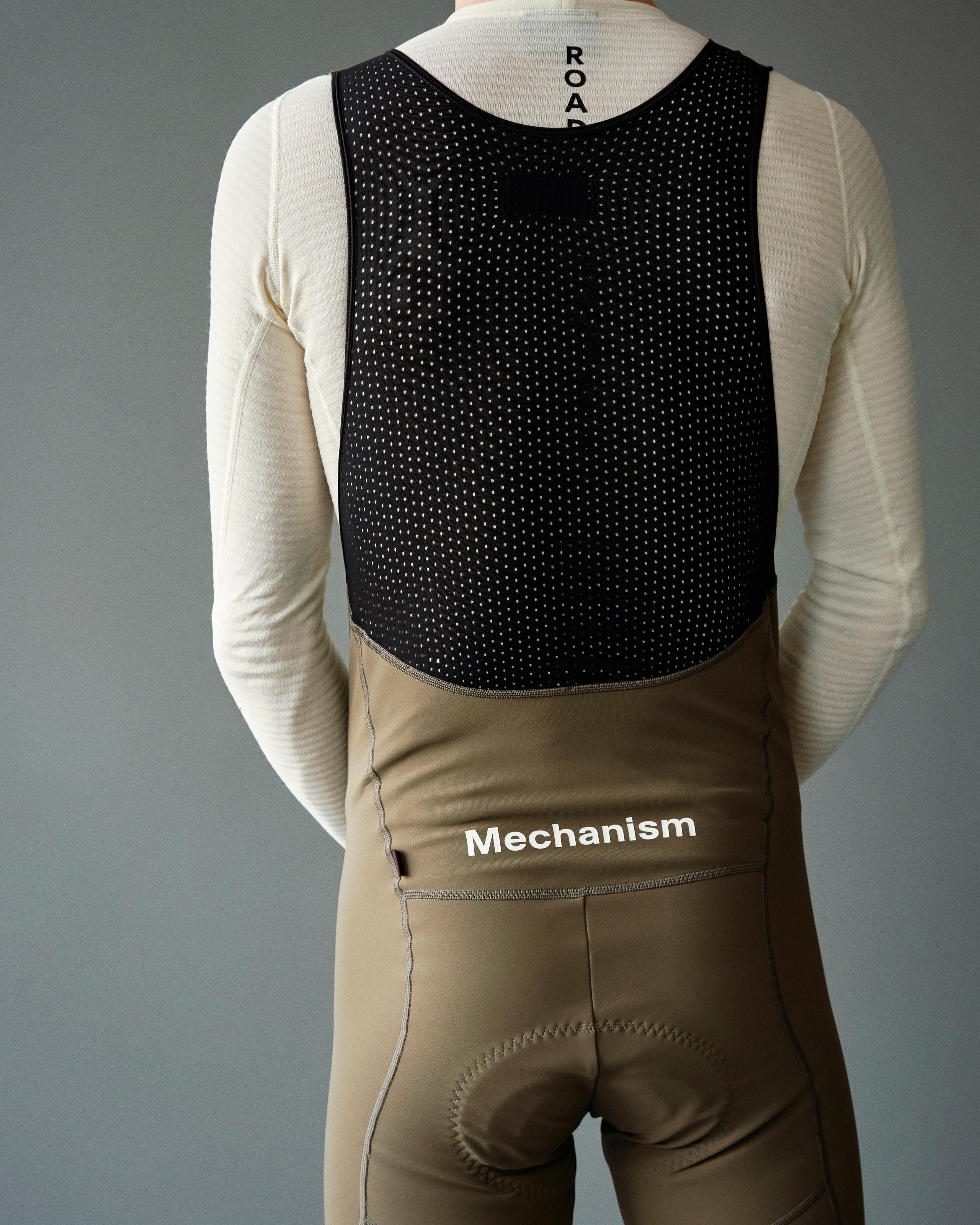 Dark Stone Mechanism Deep Winter Long cycling bibs, rear view with perforated mesh back panel