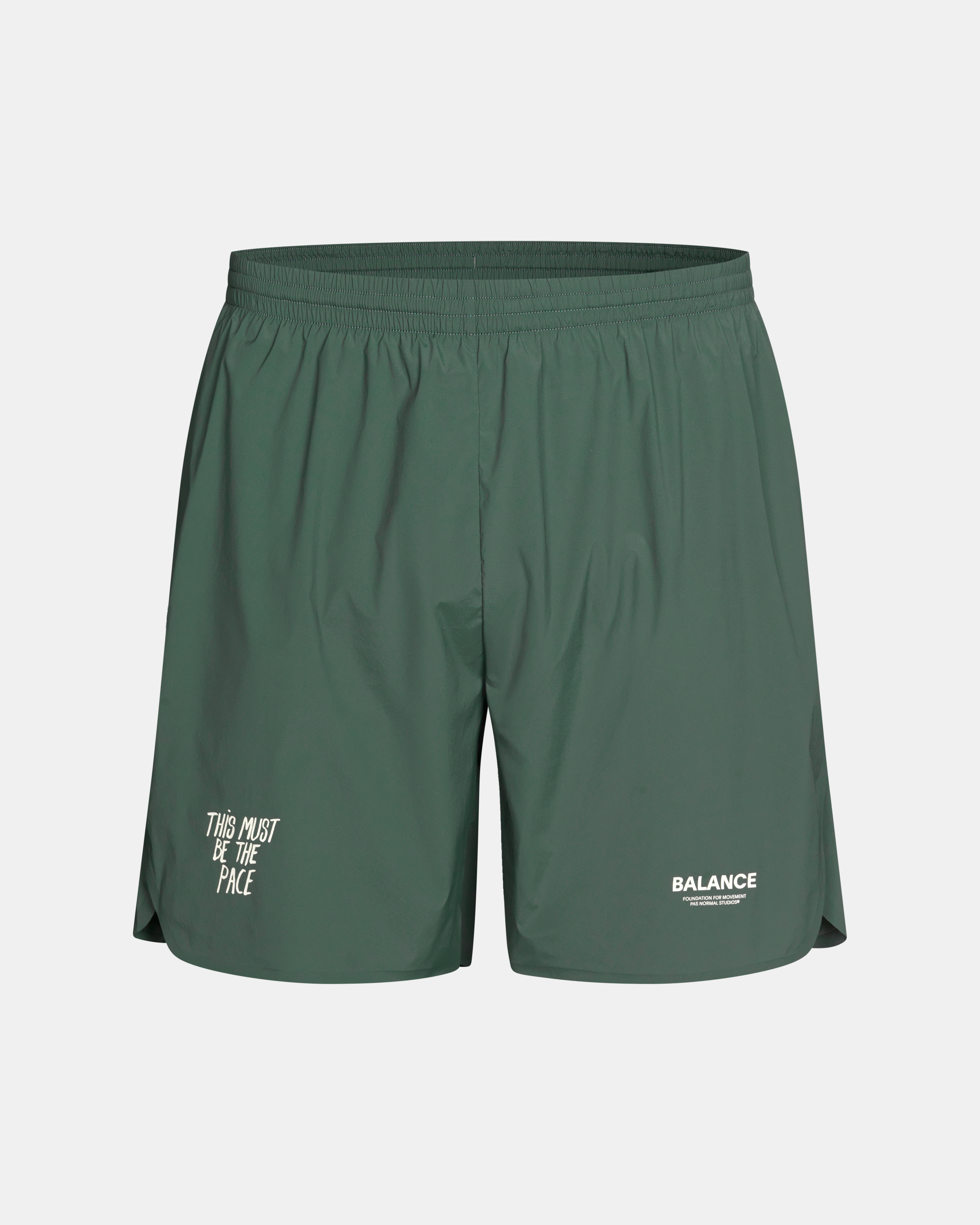 Green Balance shorts flat lay with white text print