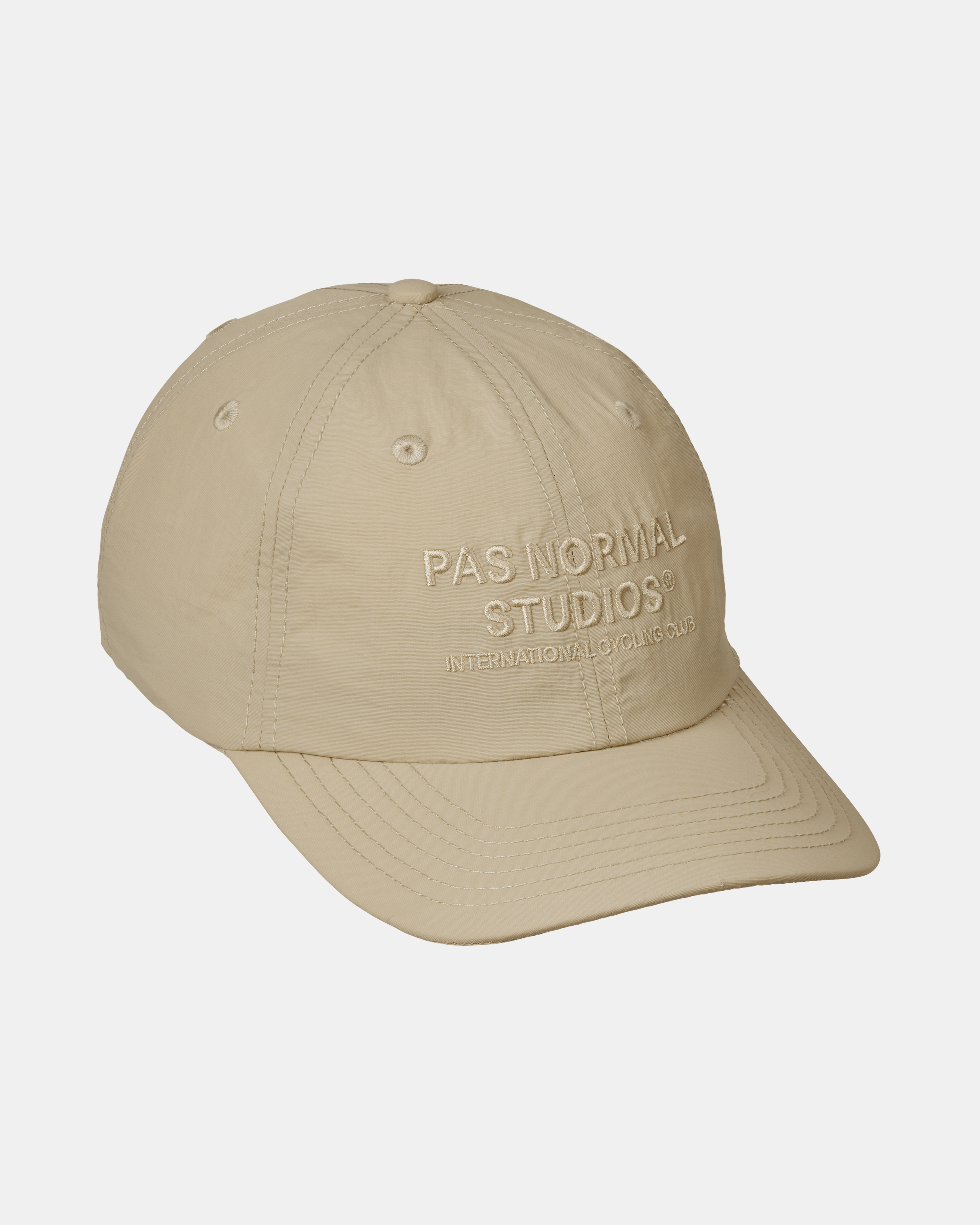Limestone Off-Race cap, three-quarter view with embossed logo text