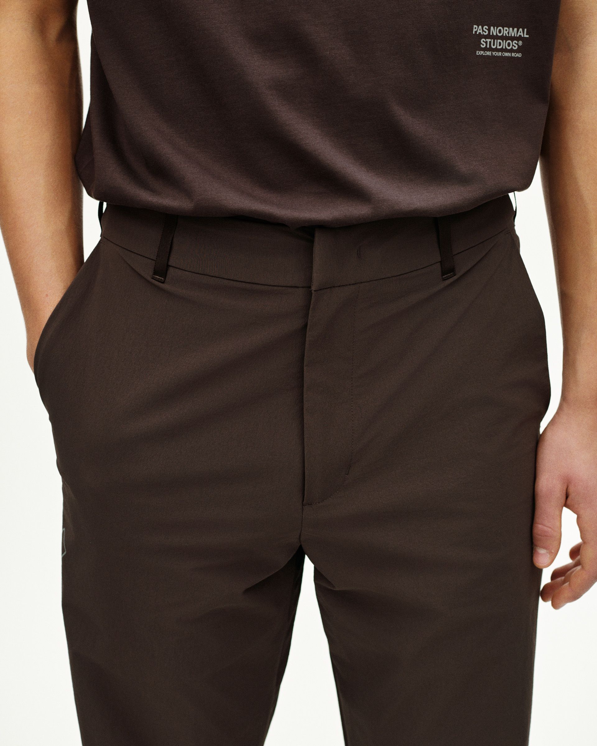 Dark Purple Off-Race Tech Pants on model, front view with tailored waistband