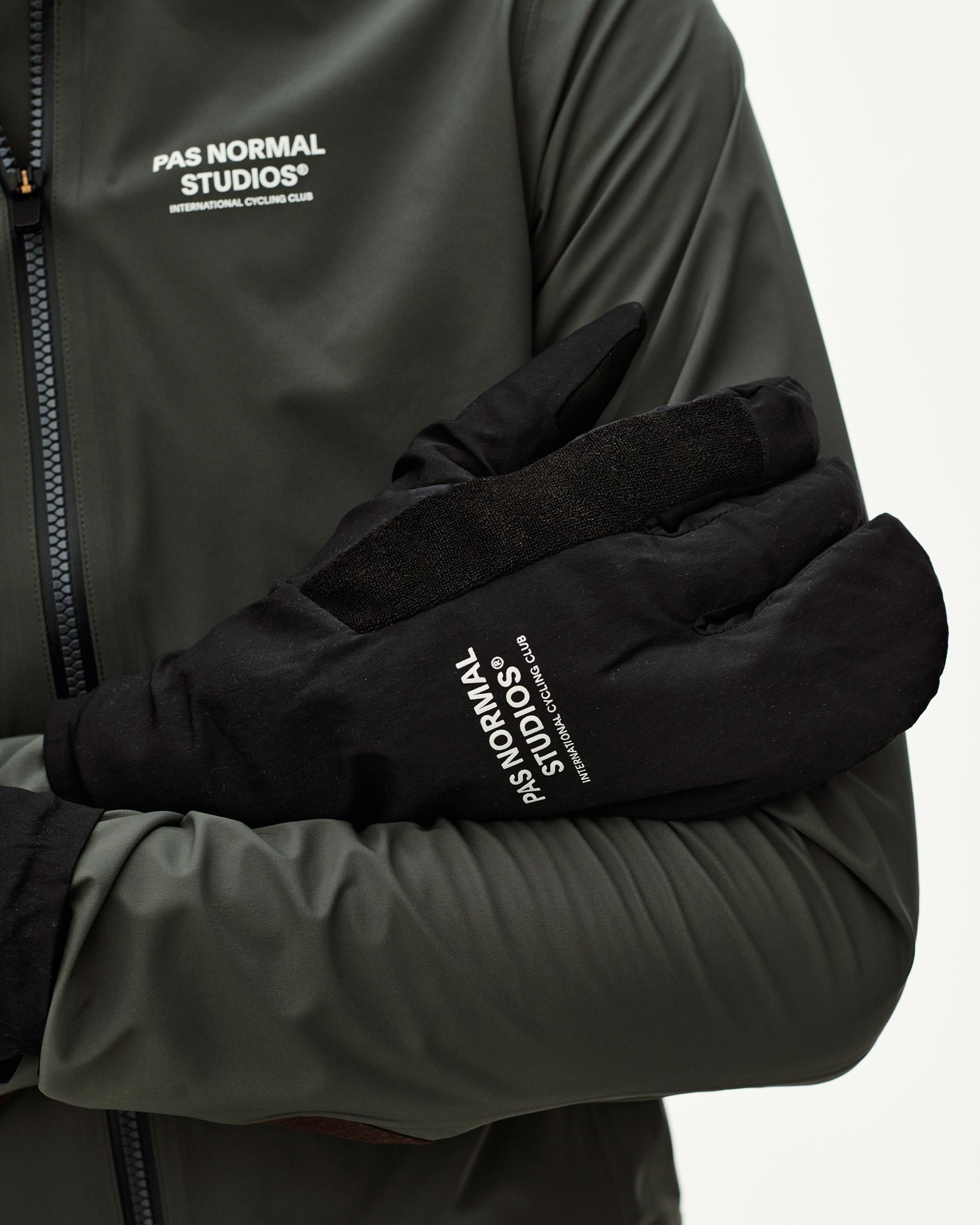 Black Logo Deep Winter Insulated cycling gloves on model, front detail view with white chest logo print