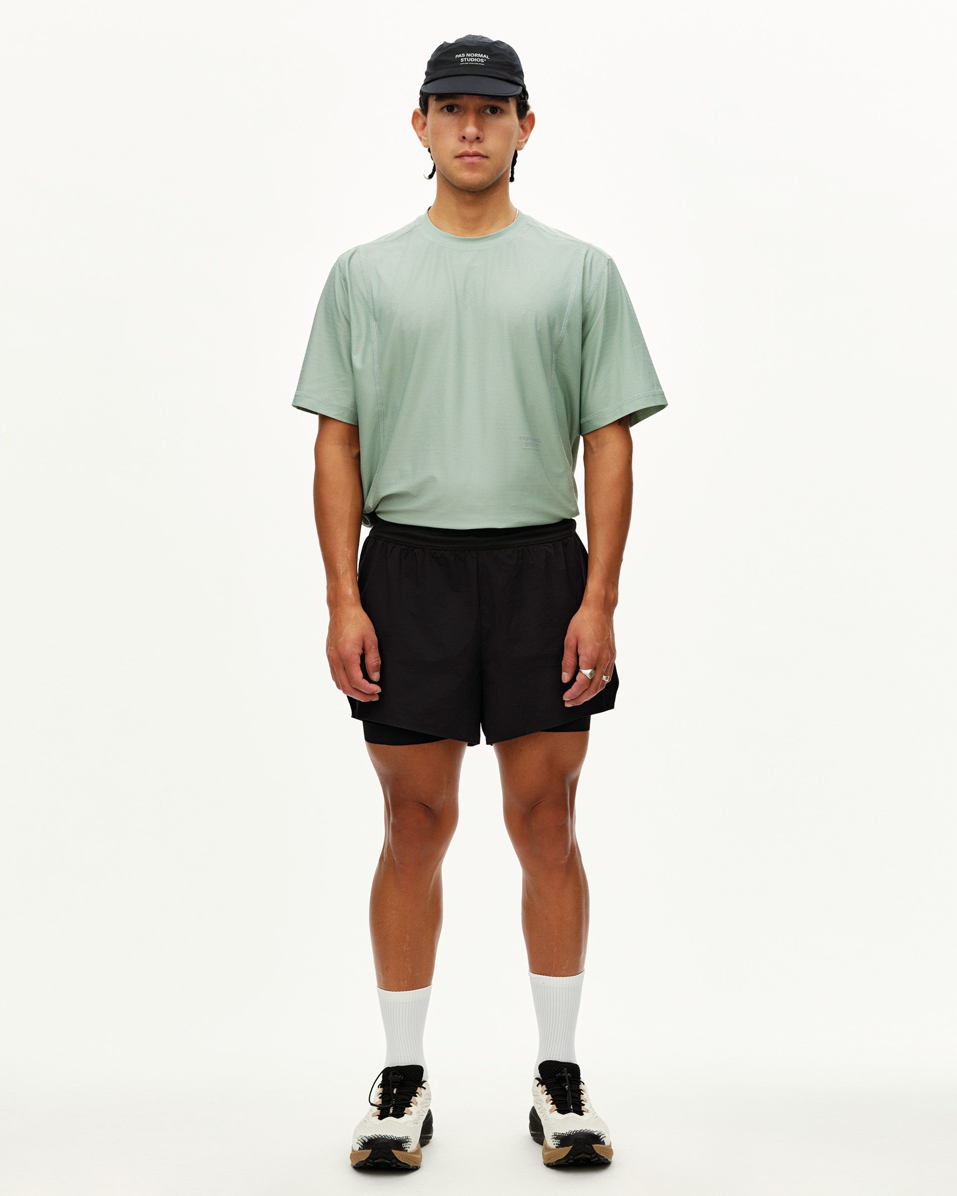 Black Balance 2-in-1 shorts on model, front view with visible inner liner layer