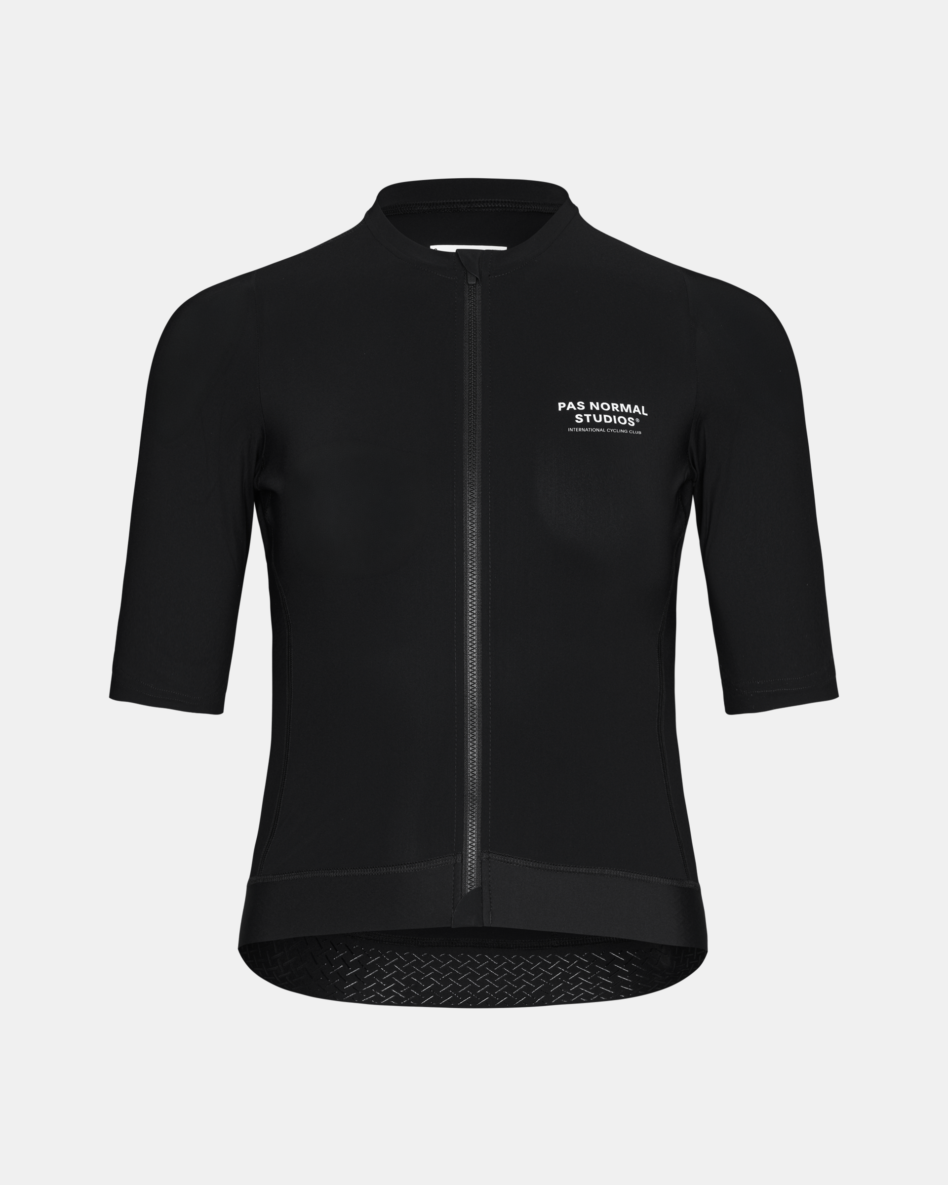 Black Essential cycling jersey, front view with white chest logo and textured hem panel