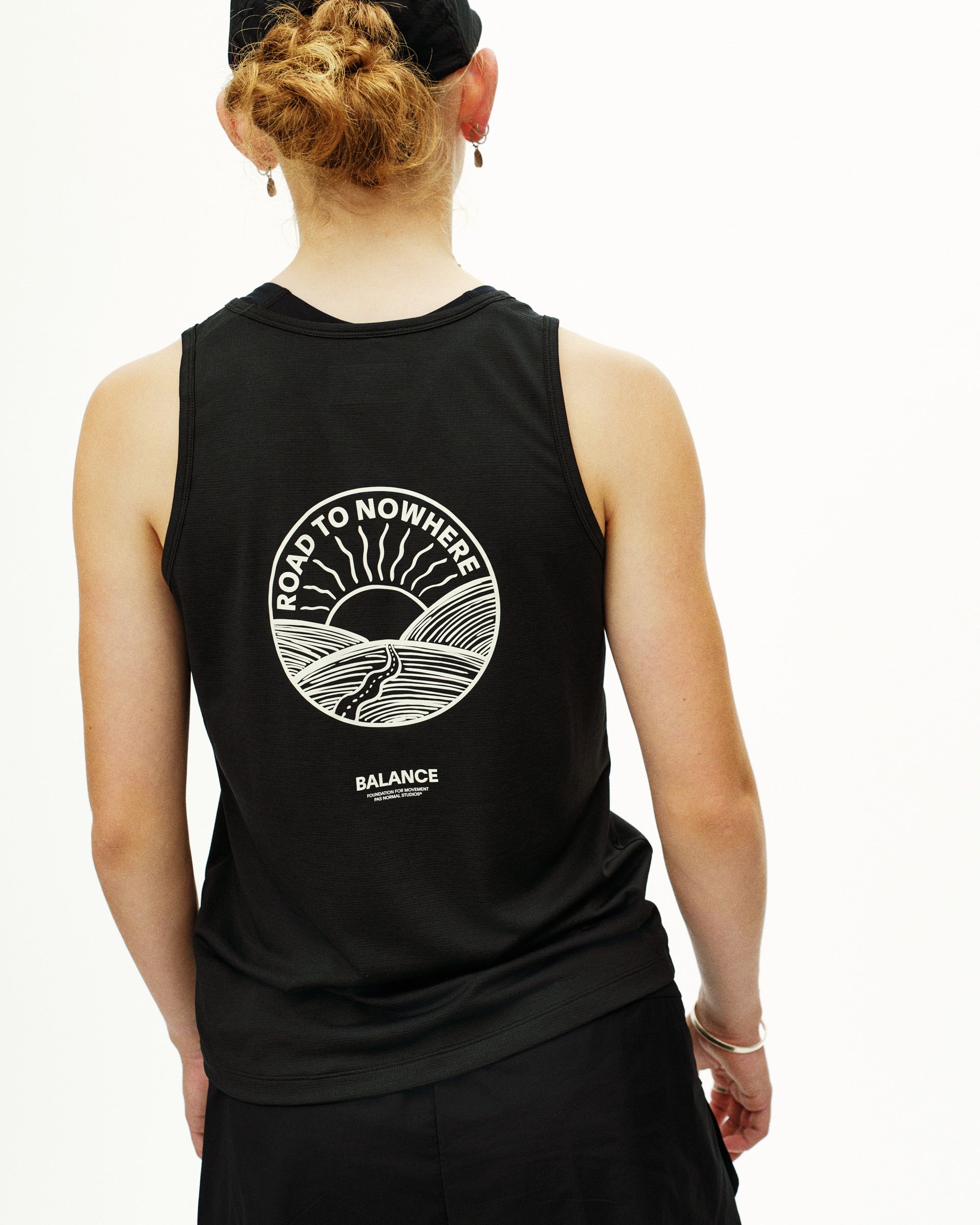Black Balance singlet on model rear view with Road to Nowhere circular back print