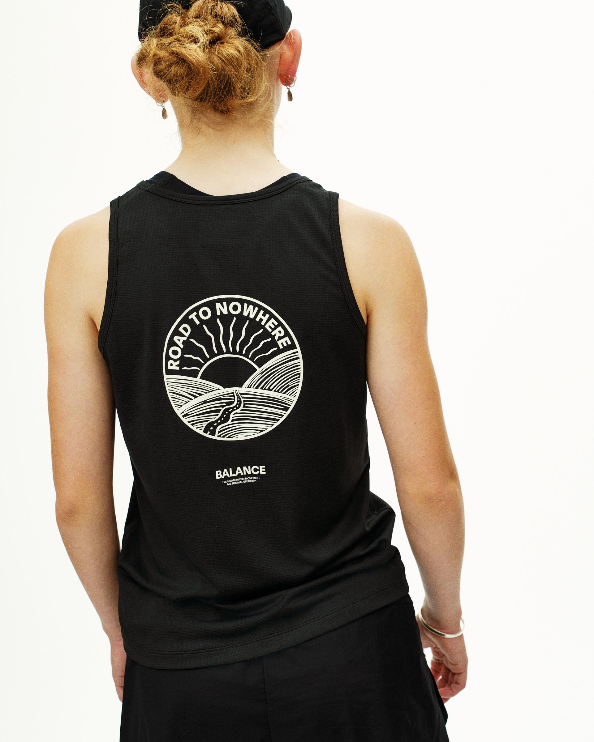 Black Balance singlet on model rear view with Road to Nowhere circular back print