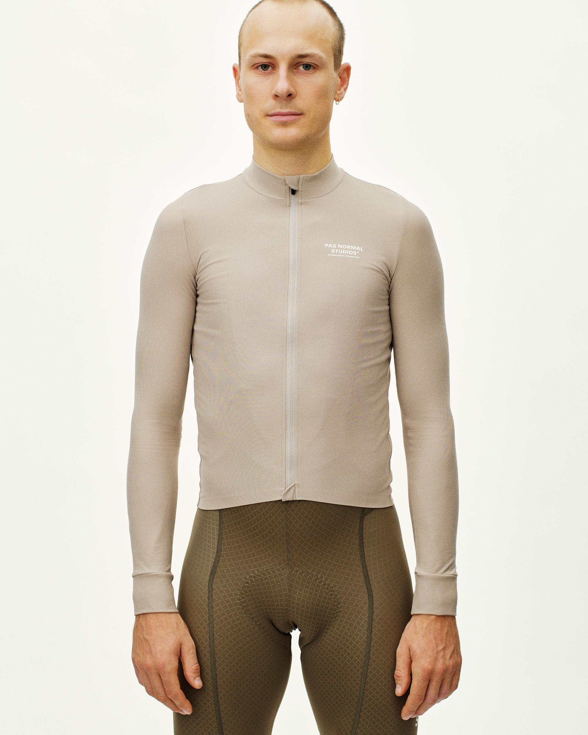Haze Mechanism long sleeve cycling jersey on model with full zip and white chest logo