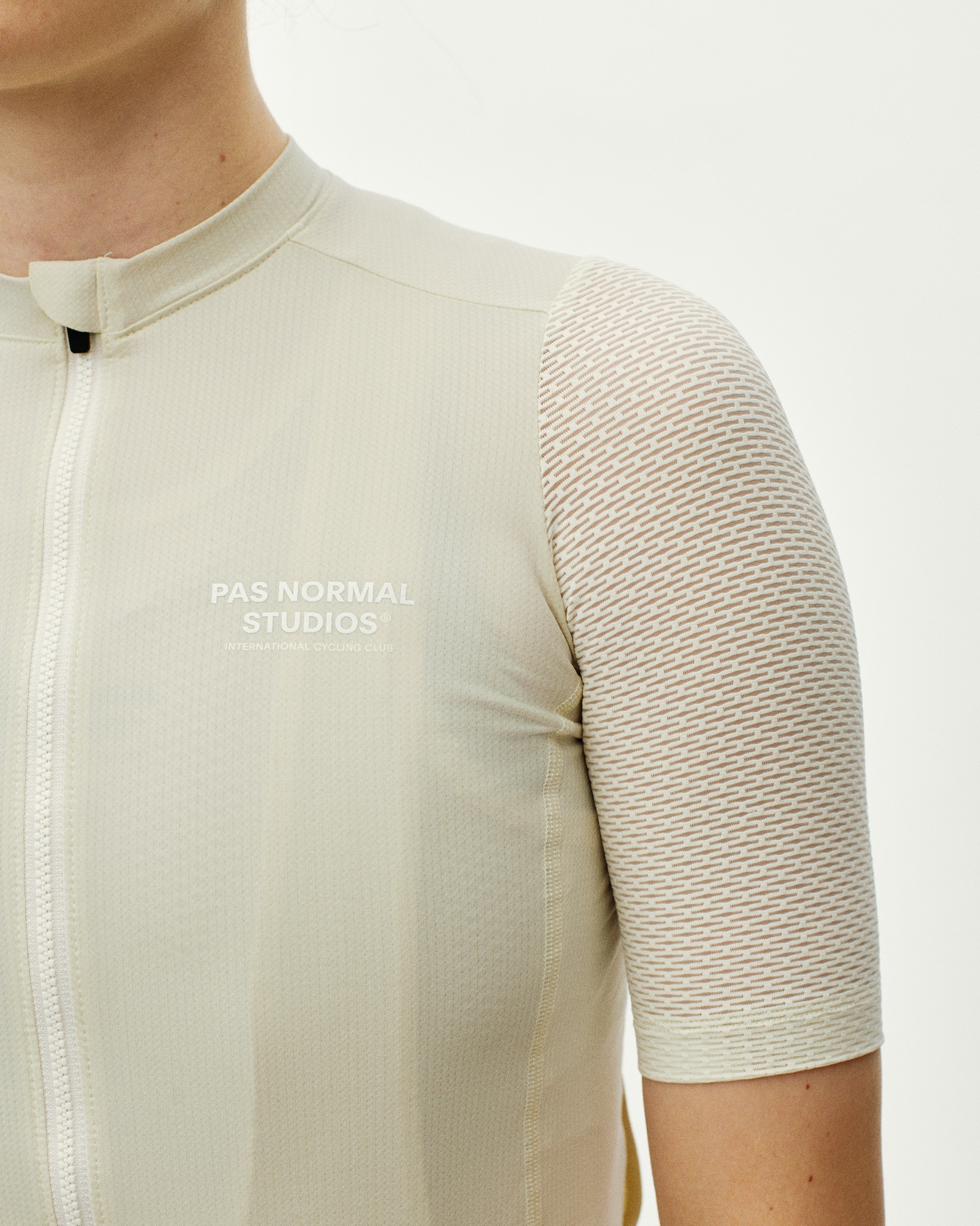 Off White Essential Light cycling jersey on model with textured sleeves