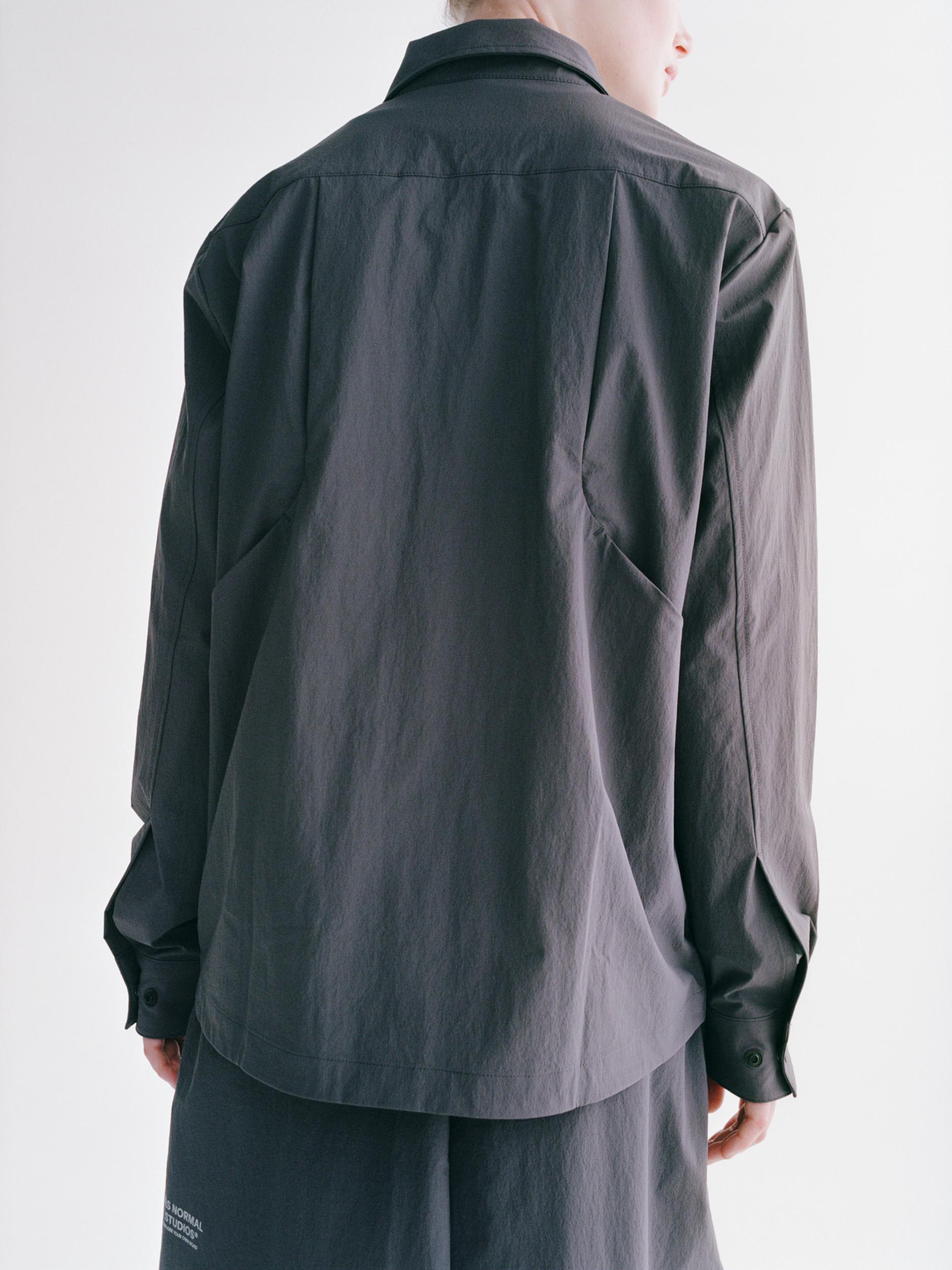Grey Off-Race Tech Overshirt, rear view on model with collar and button cuffs