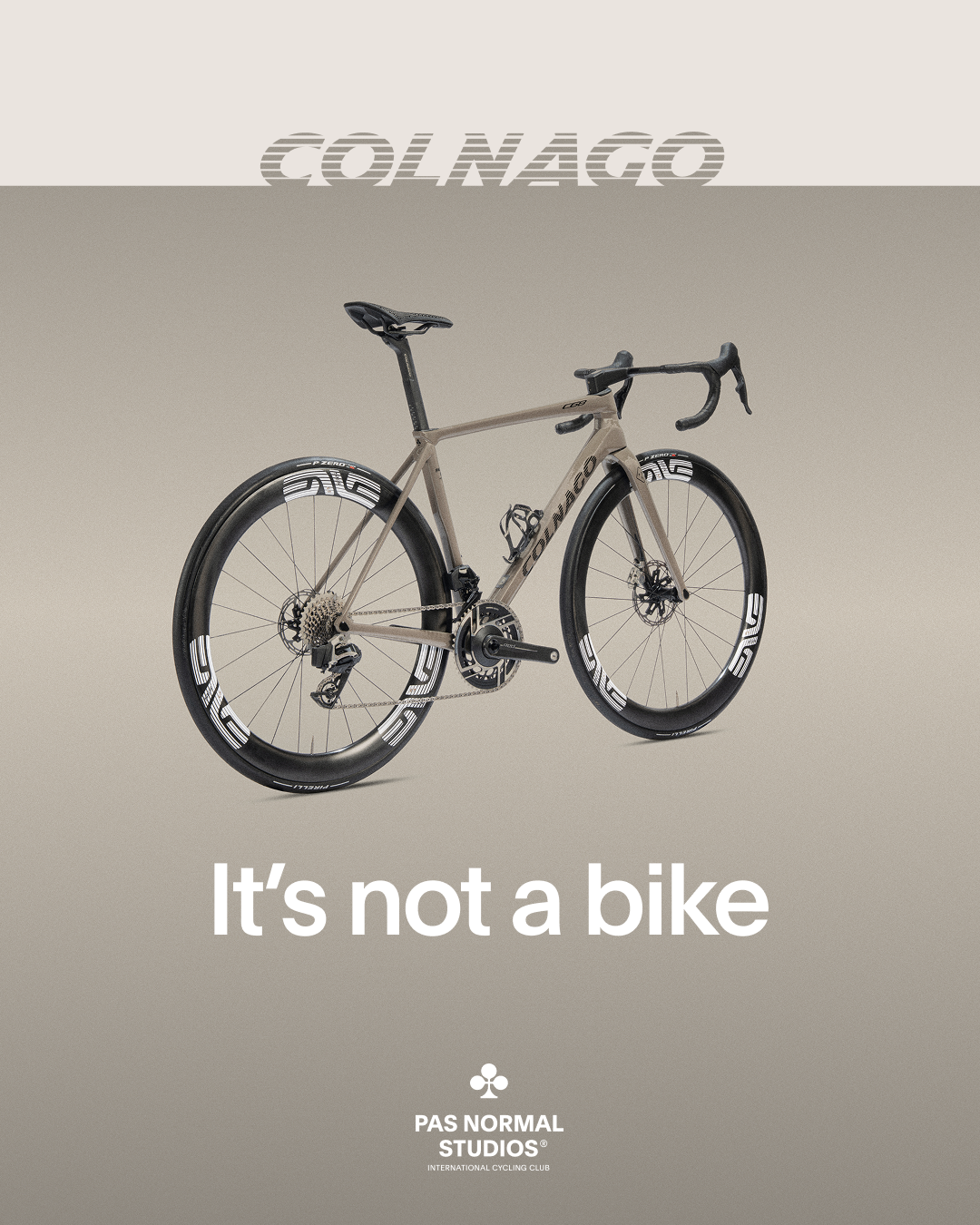 Colnago road bike in beige with black components on neutral background for brand collaboration