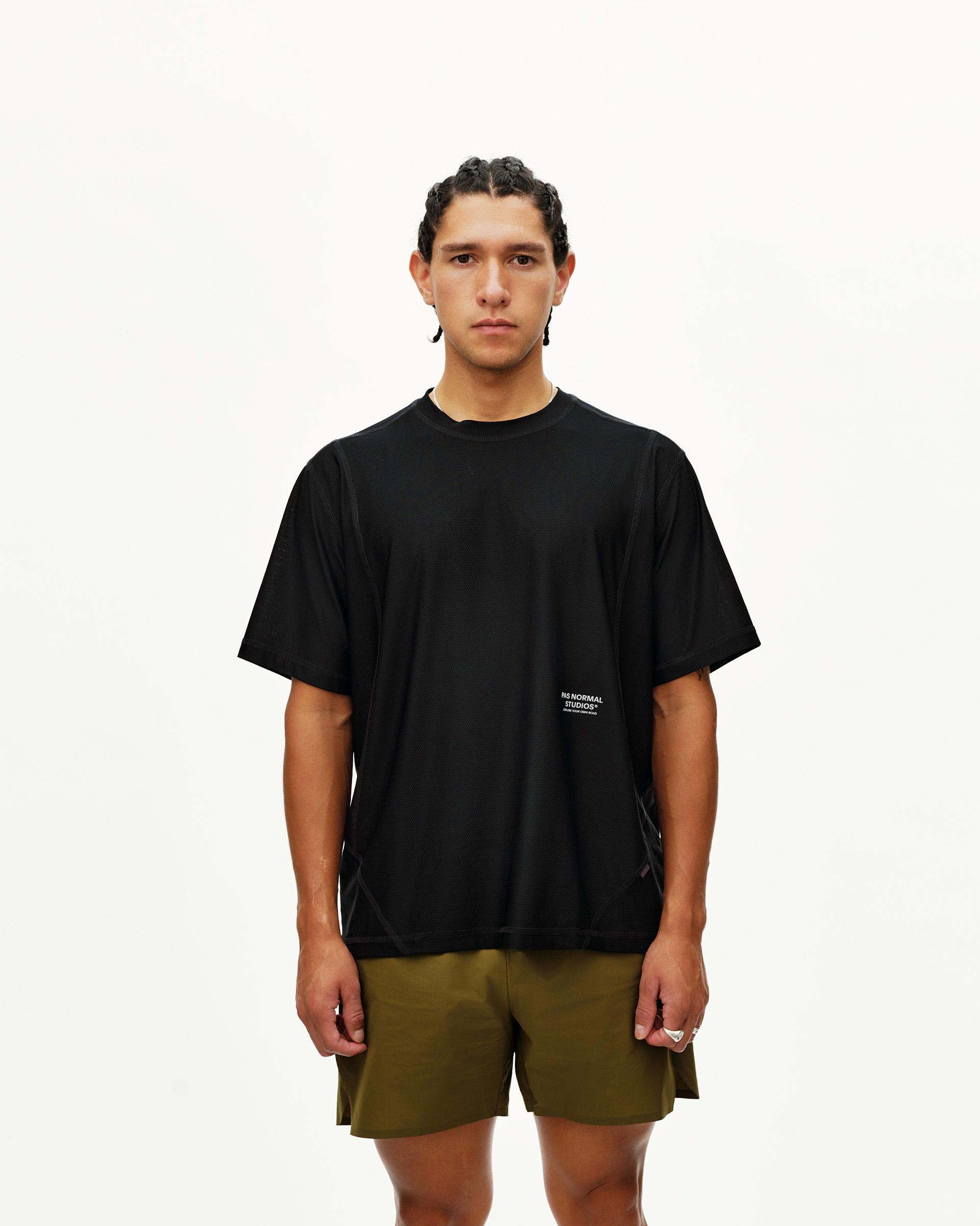 Black Balance T-shirt on model, front view with small chest logo print