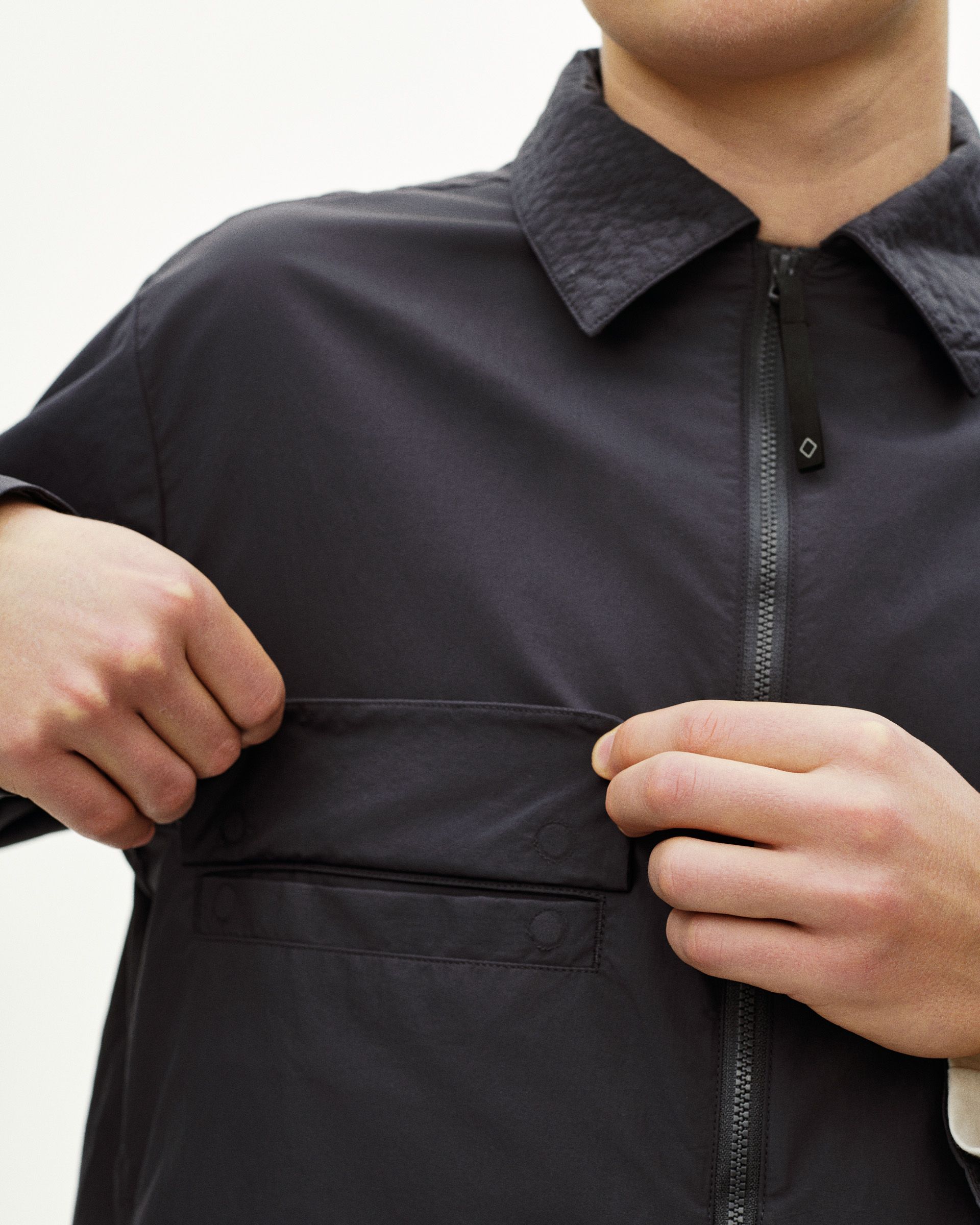 Grey Off-Race Utility jacket on model with textured collar and chest pocket