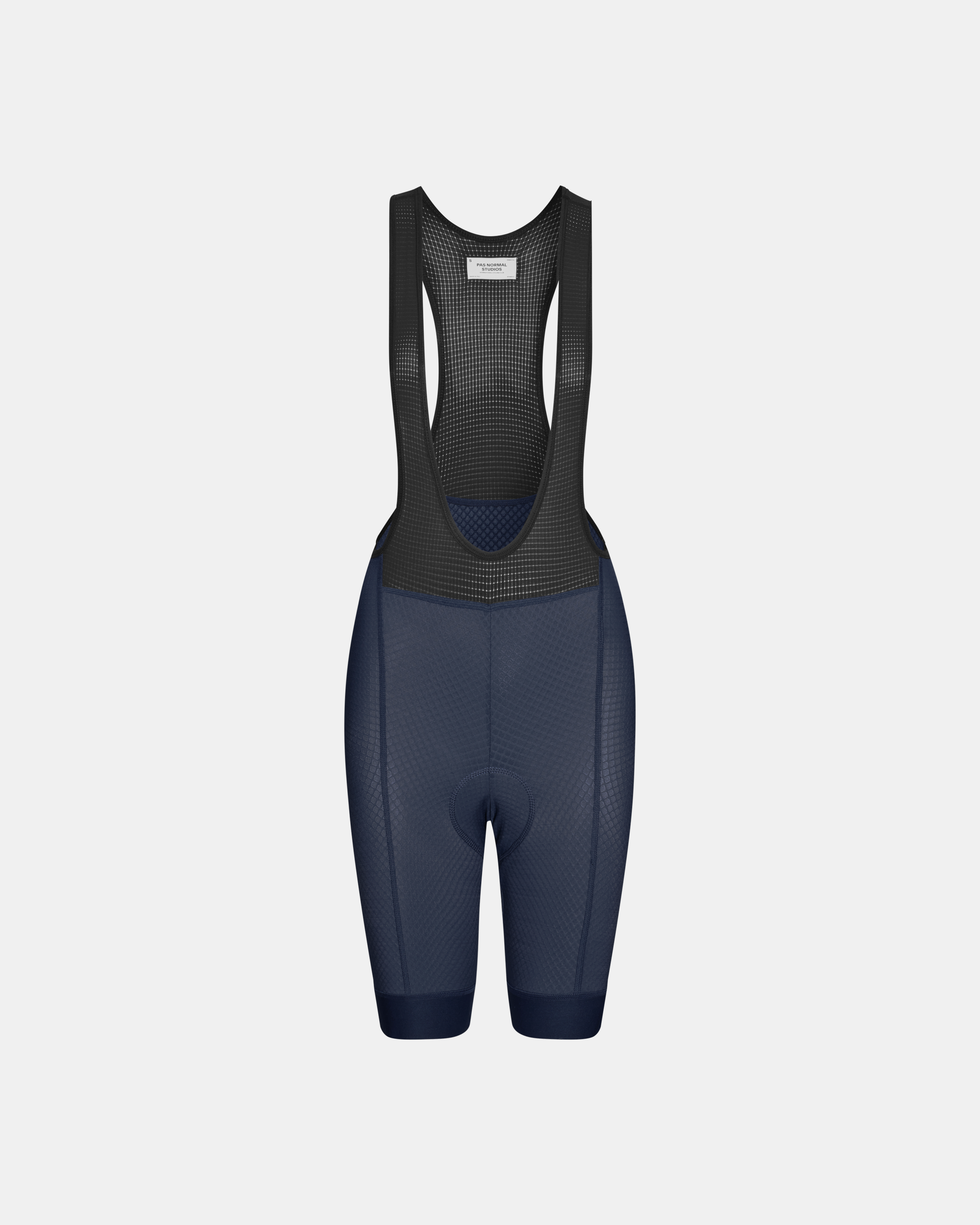 Navy Essential cycling bibs, front flat lay with black mesh bib straps