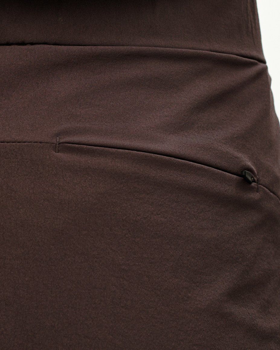 Dark Purple Off-Race Tech Skirt, detail view showing side zip pocket