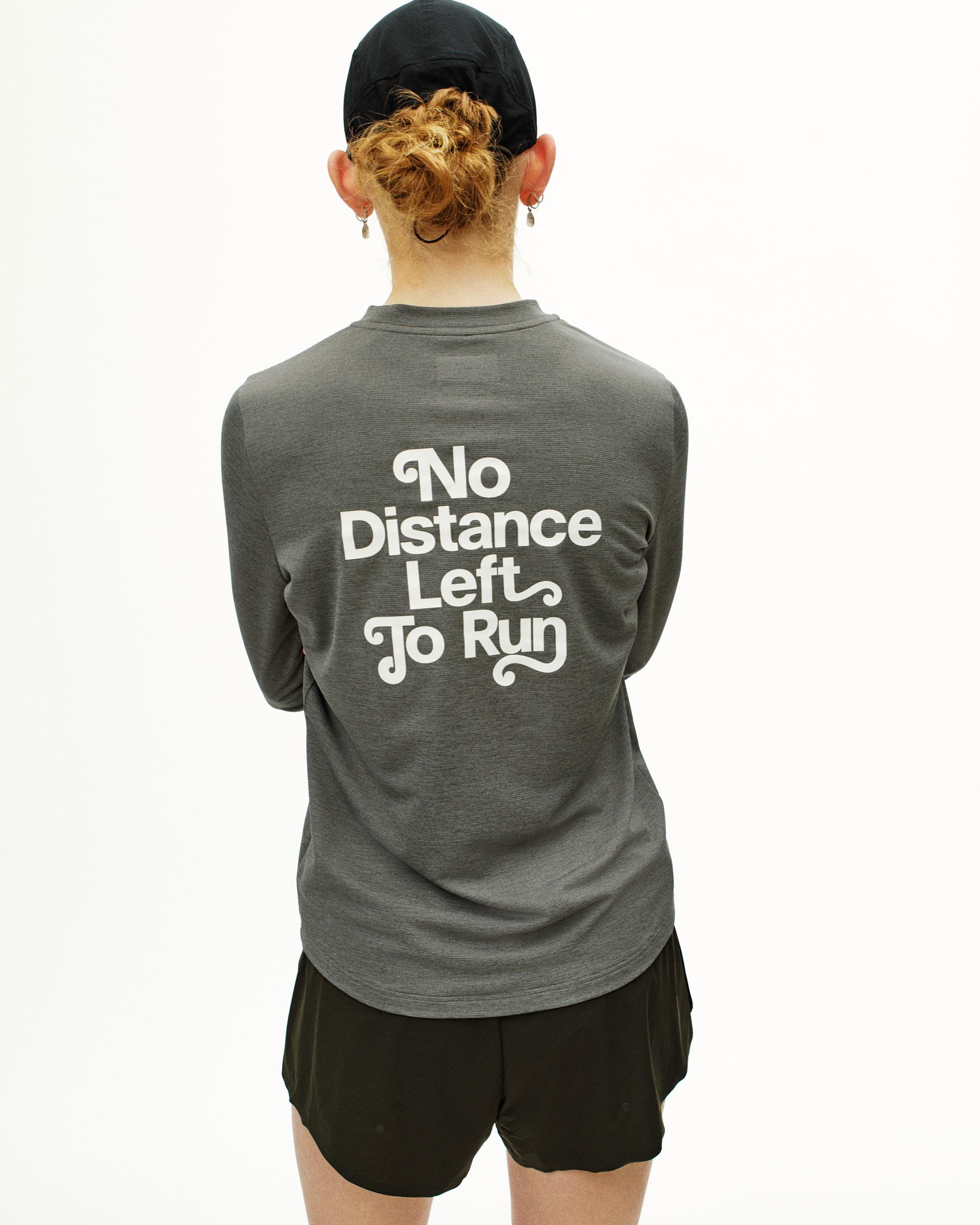 Grey Balance long sleeve t-shirt, rear view on model with white "No Distance Left To Run" back print
