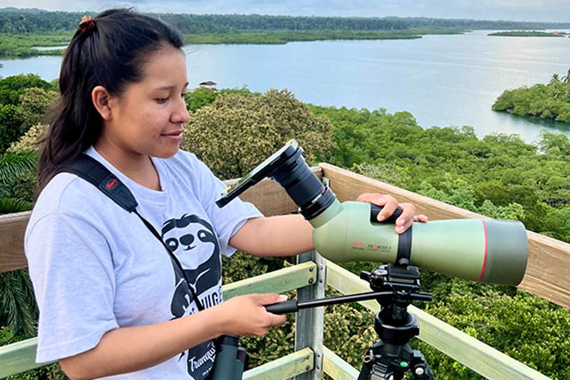 Brenda Sanchez Kowa Ambassador digiscoping on Tranquilo Bay tower