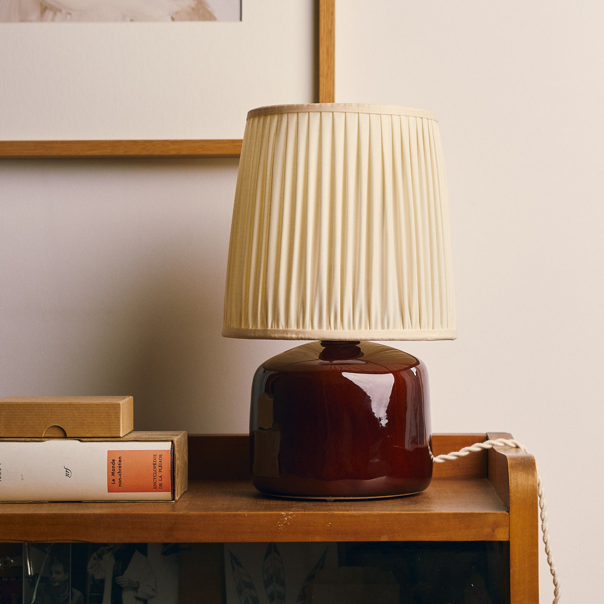 Table lamp store on bookshelf