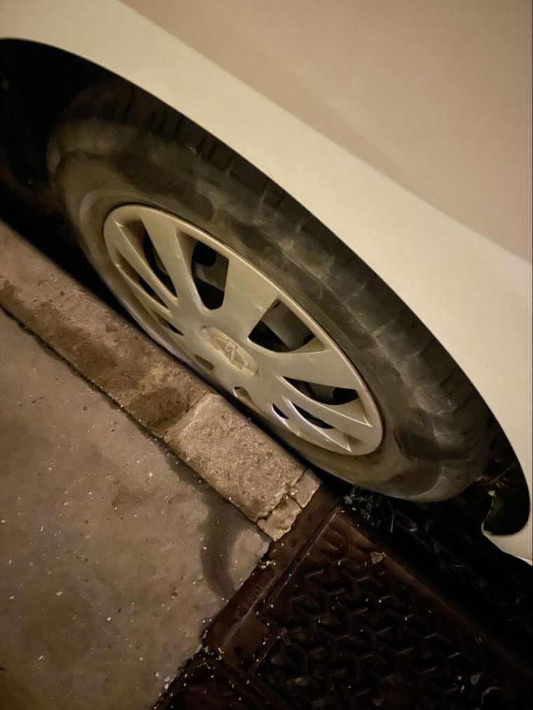Car parked too close to curbside
