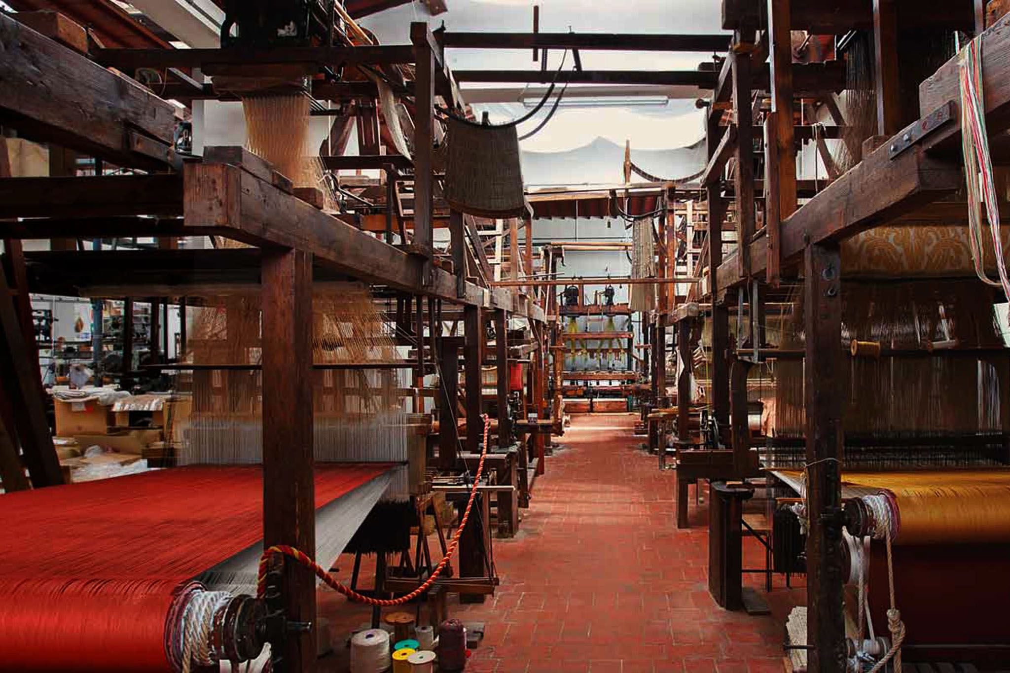 Ancient looms still producing excellent cloth in Florence.