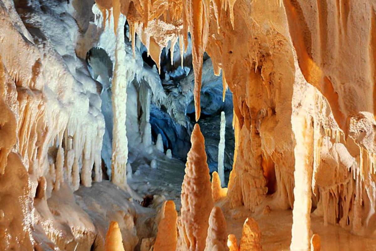 Monumental stalagmites and stalactites inhabit the Frasassi Caves