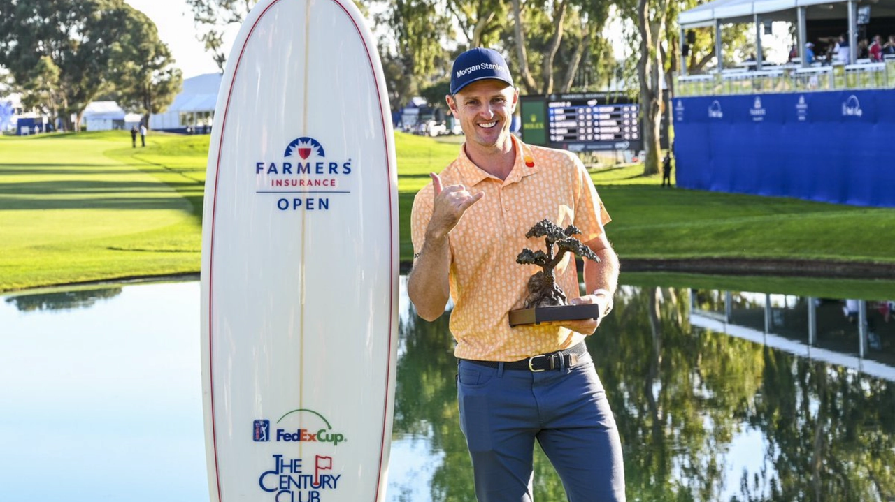 Justin Rose and surfboard and trophy at Farmers Insurance Golf