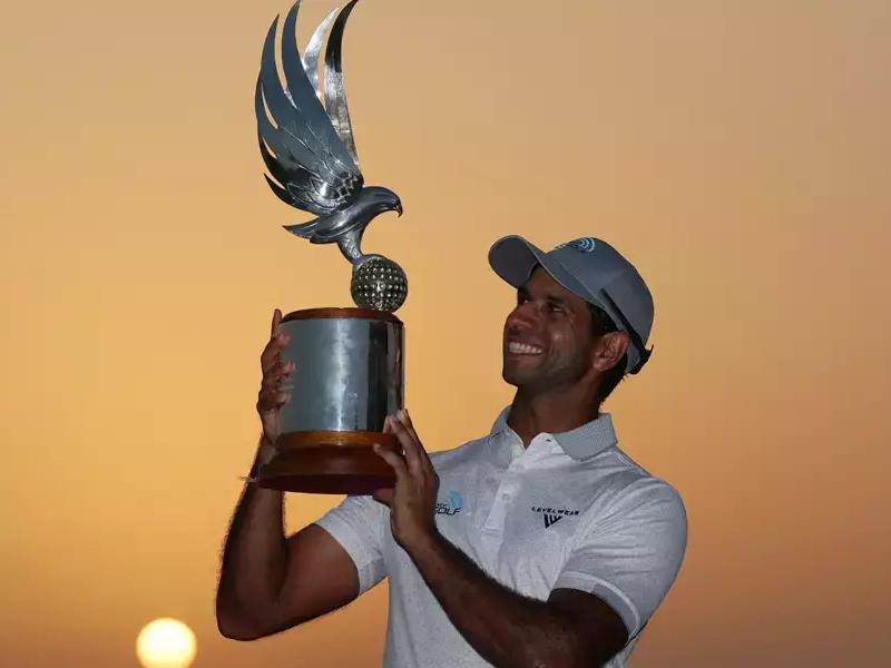Aaron Rai holds Abu Dhabi HSBC Championship trophy