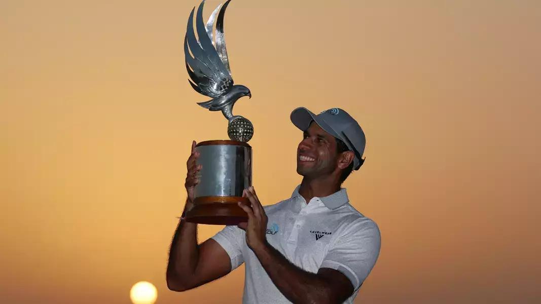 Aaron Rai holds Abu Dhabi HSBC Championship trophy