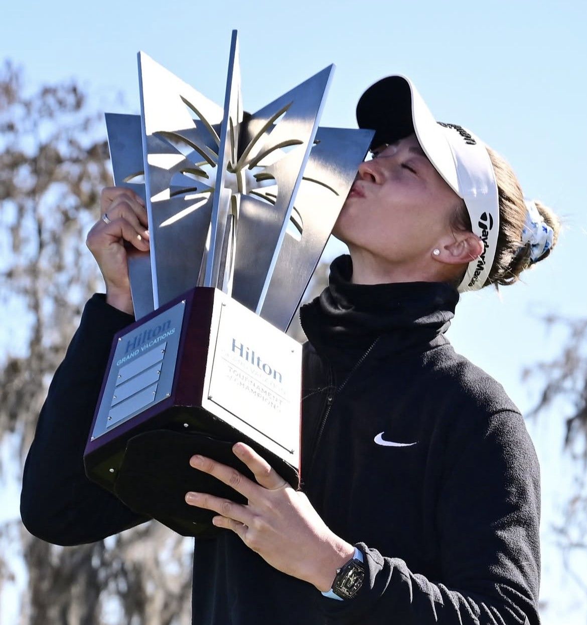 Nelly Korda kisses the Tournament of Champions trophy