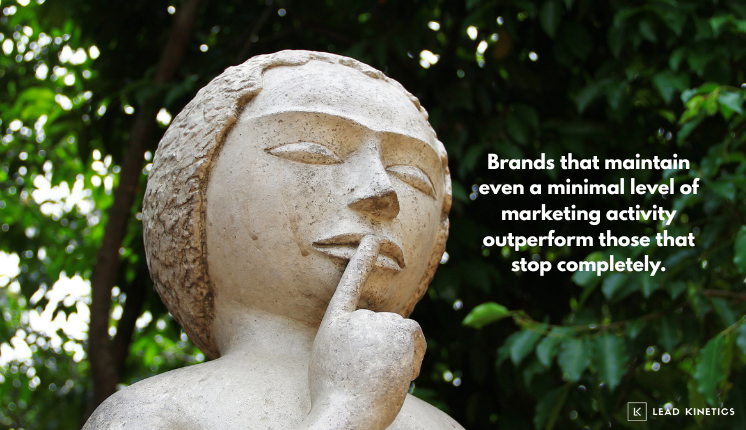 A stone statue holding a finger to its lips, beside the words 'Brands that maintain even a minimal level of marketing activity outperform those that stop completely.'