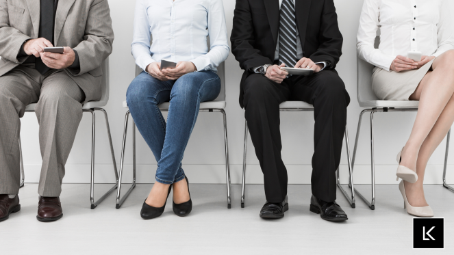 Business owner interviewing a marketing graduate candidate